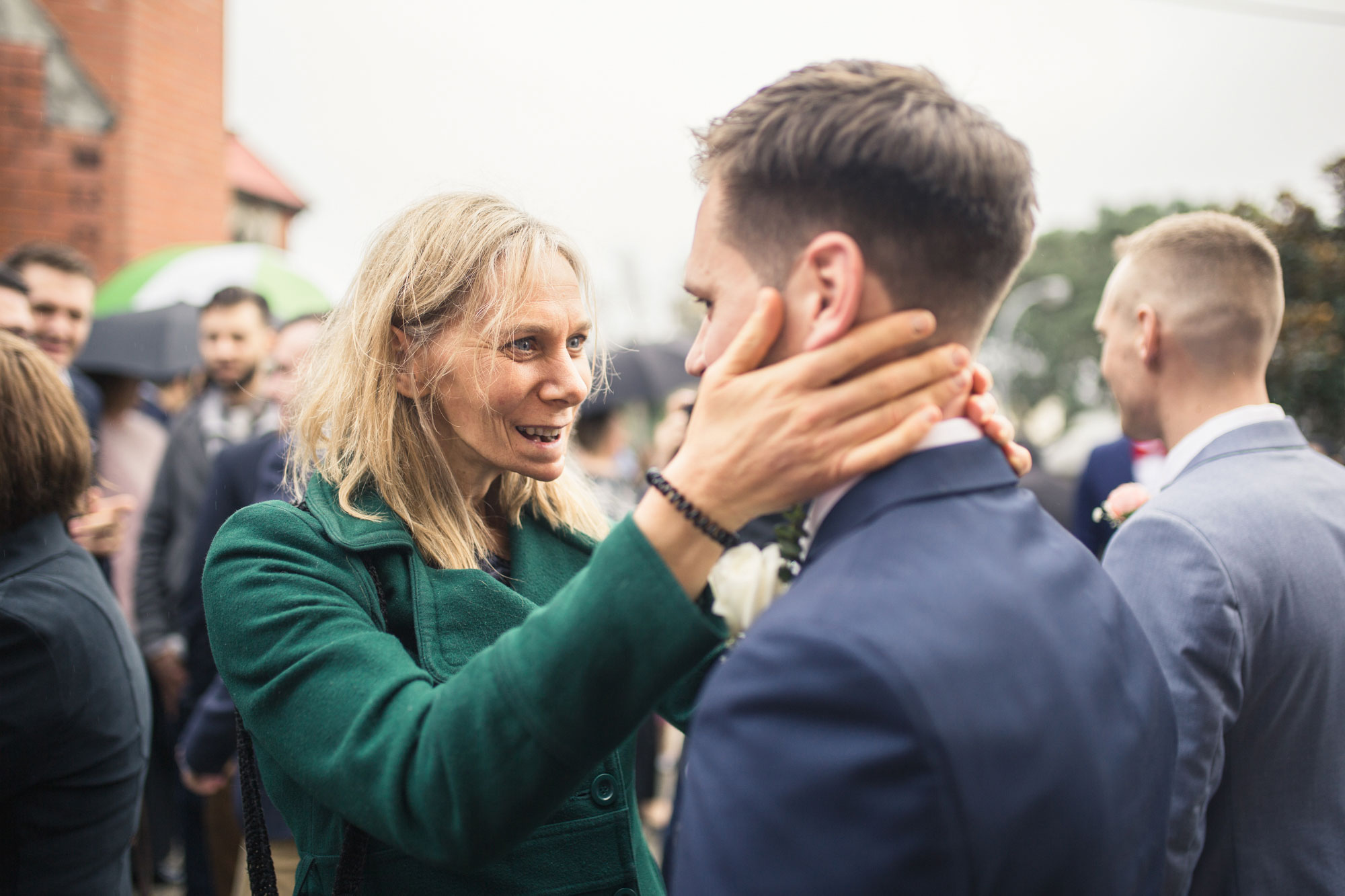 wedding guest congratulating the groom