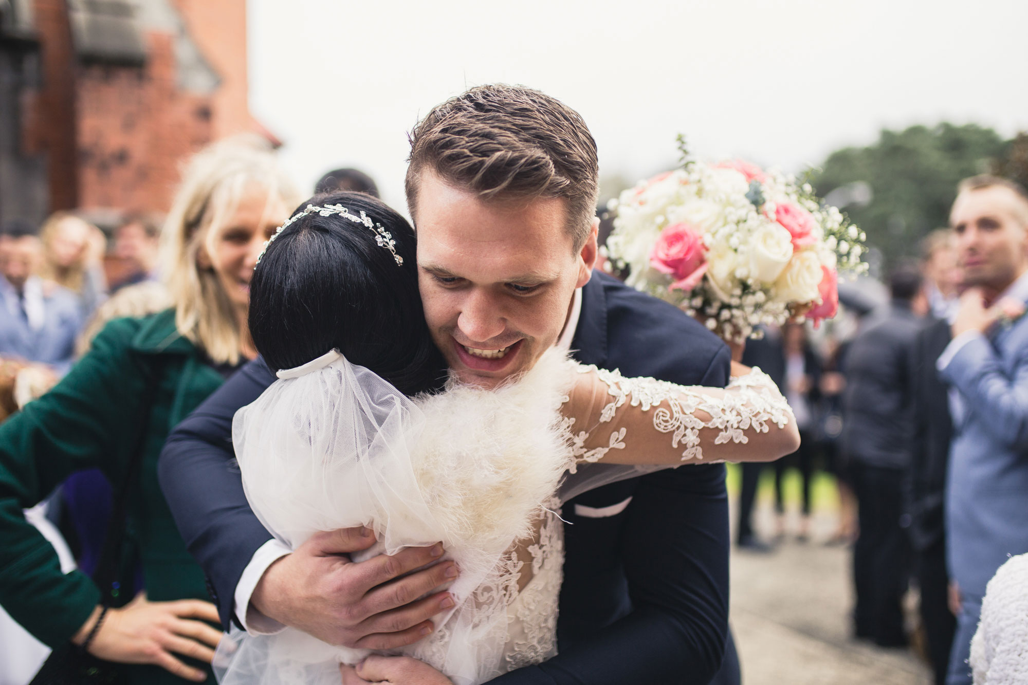 guest embracing the bride