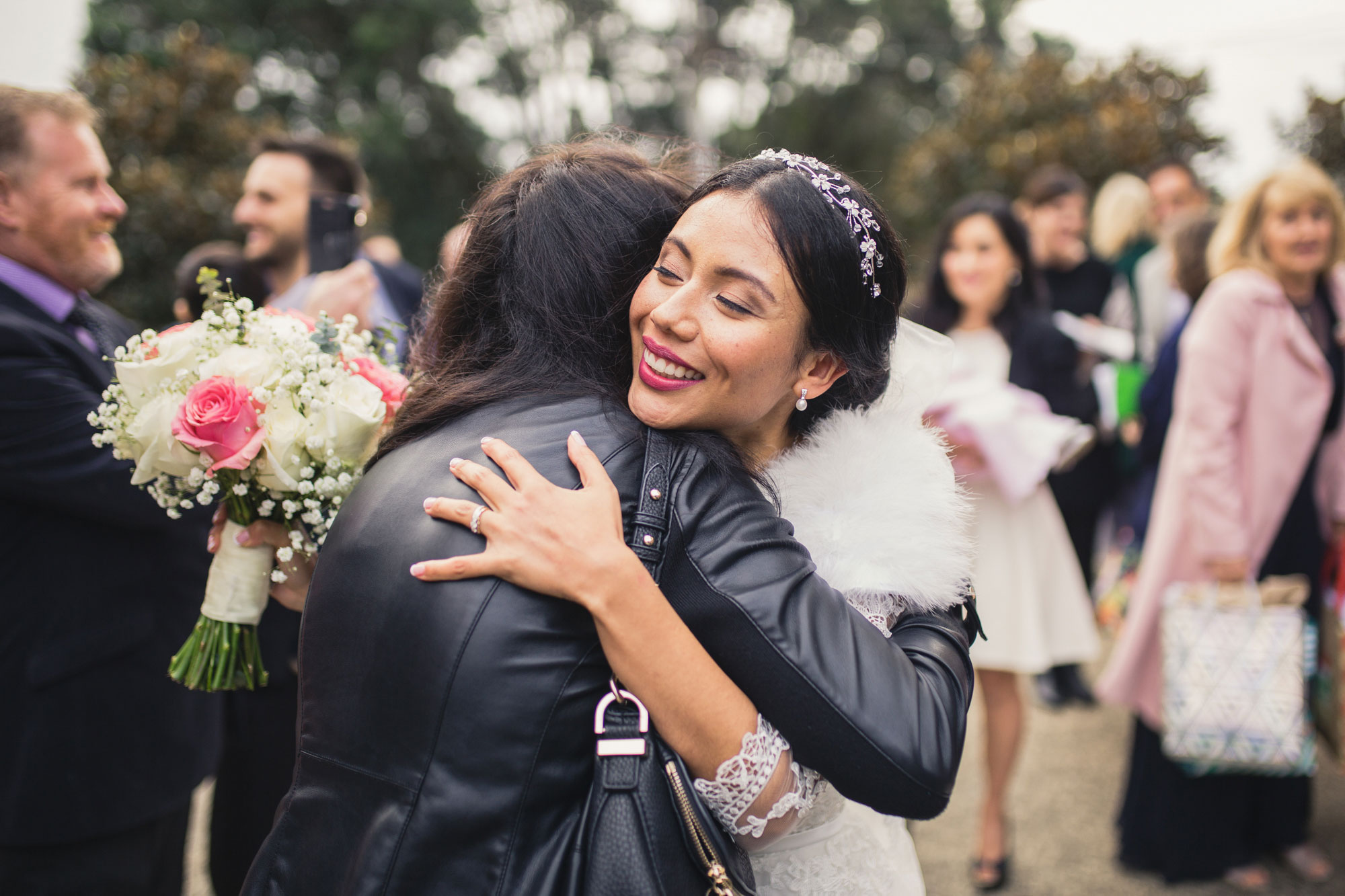 bride hugging friend