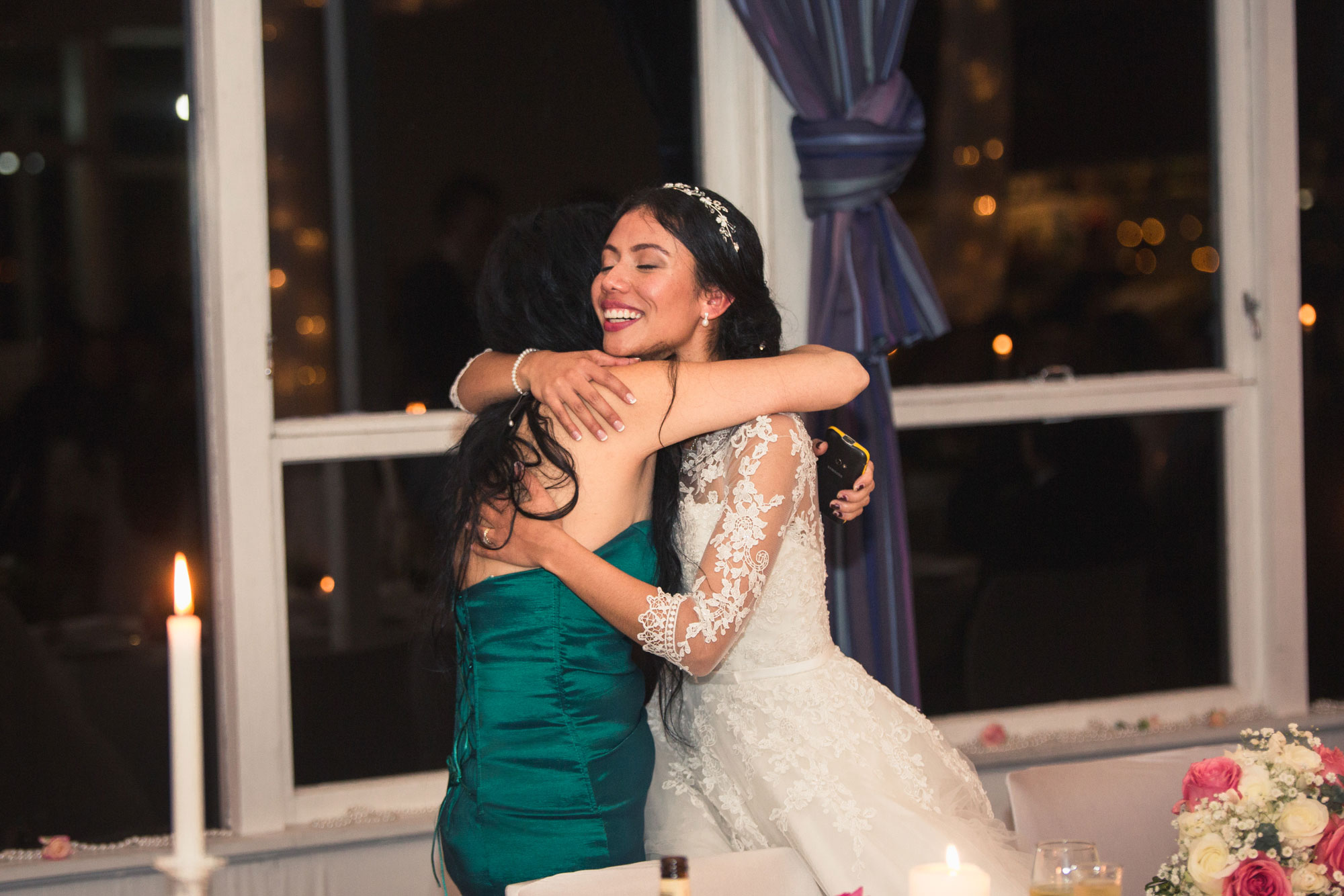 bride hugging guest