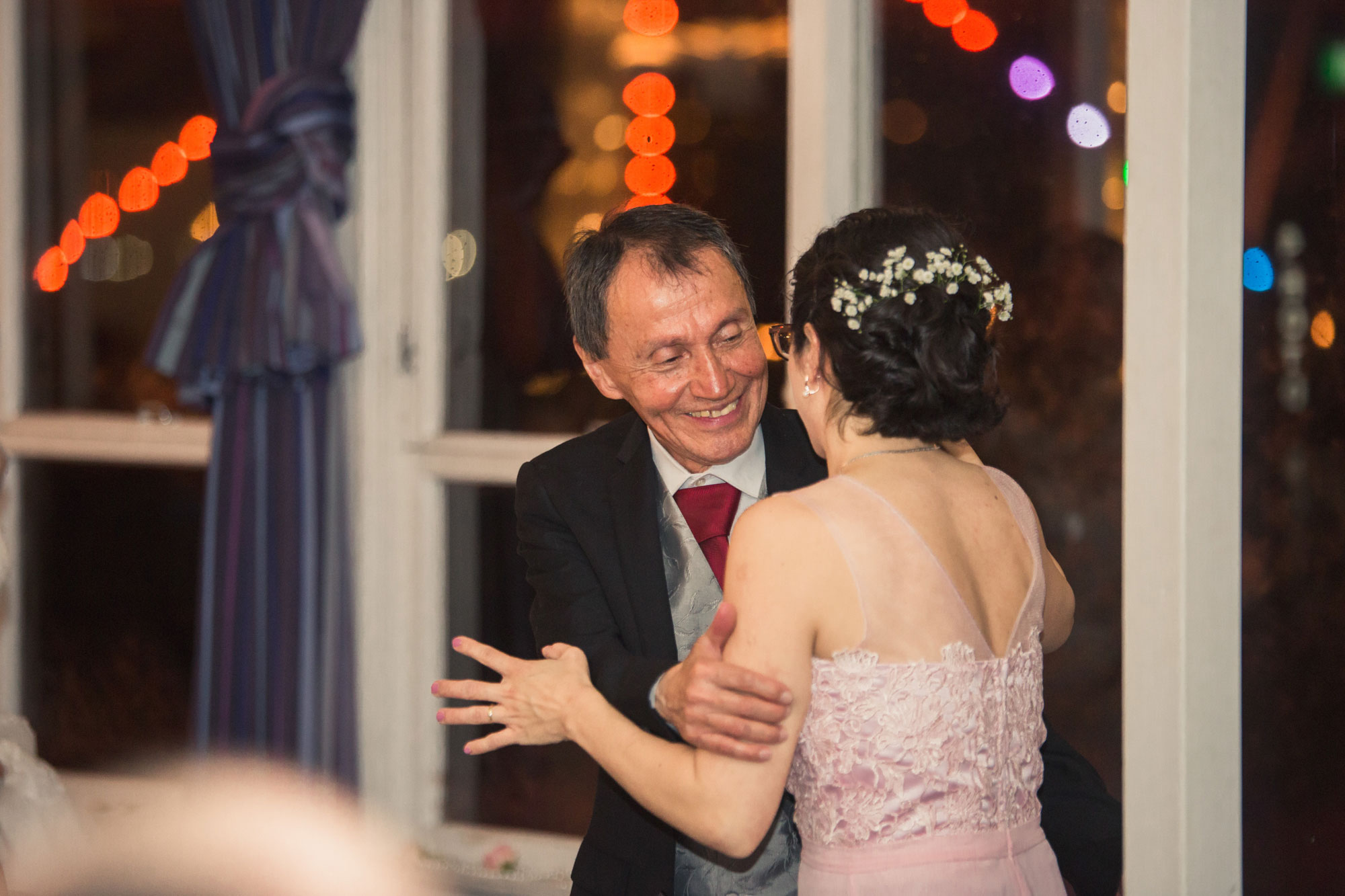 father hugging daughter