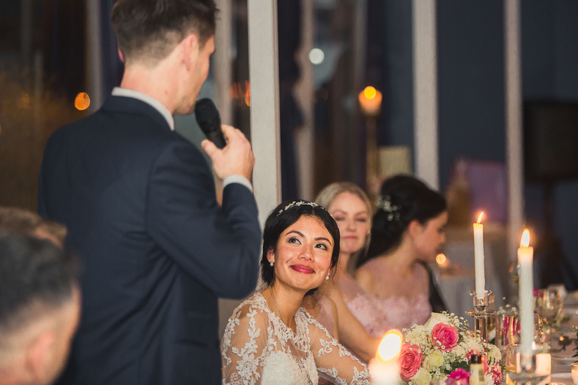 bride listening to groom speech