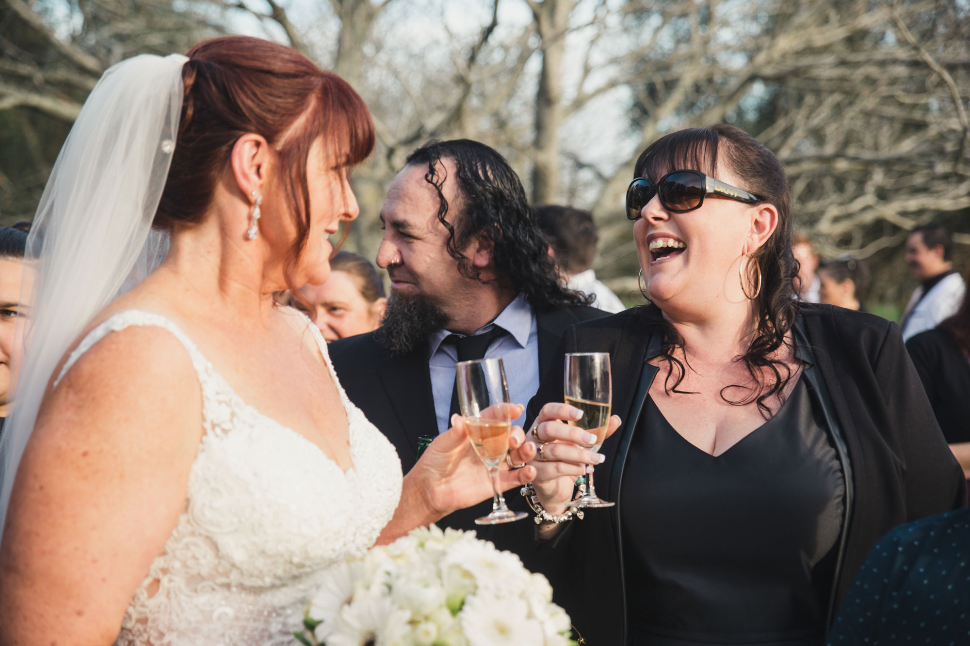 bride and guest laughing