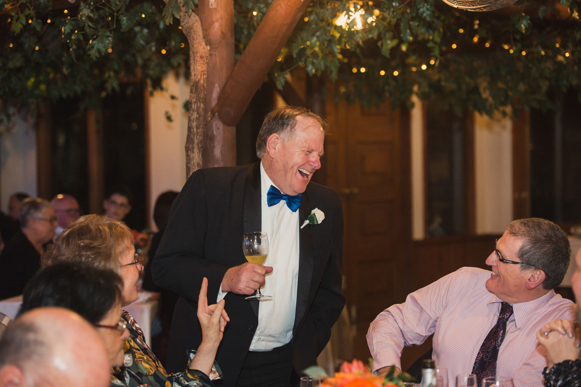 father of the bride laughing