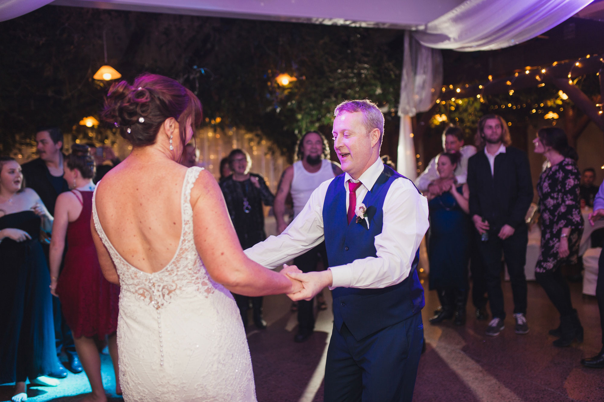 bride and groom having fun markovina