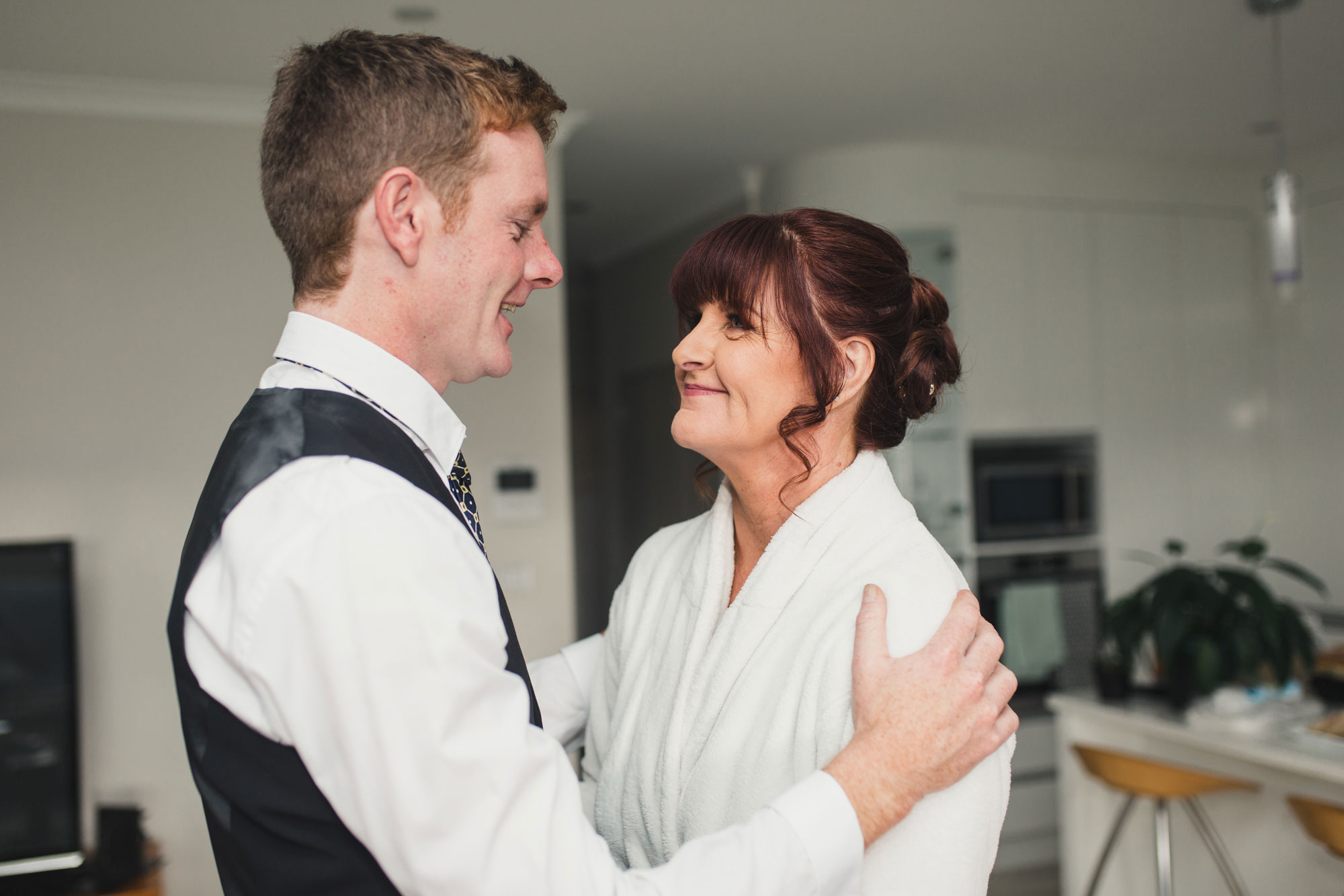 bride looking at son