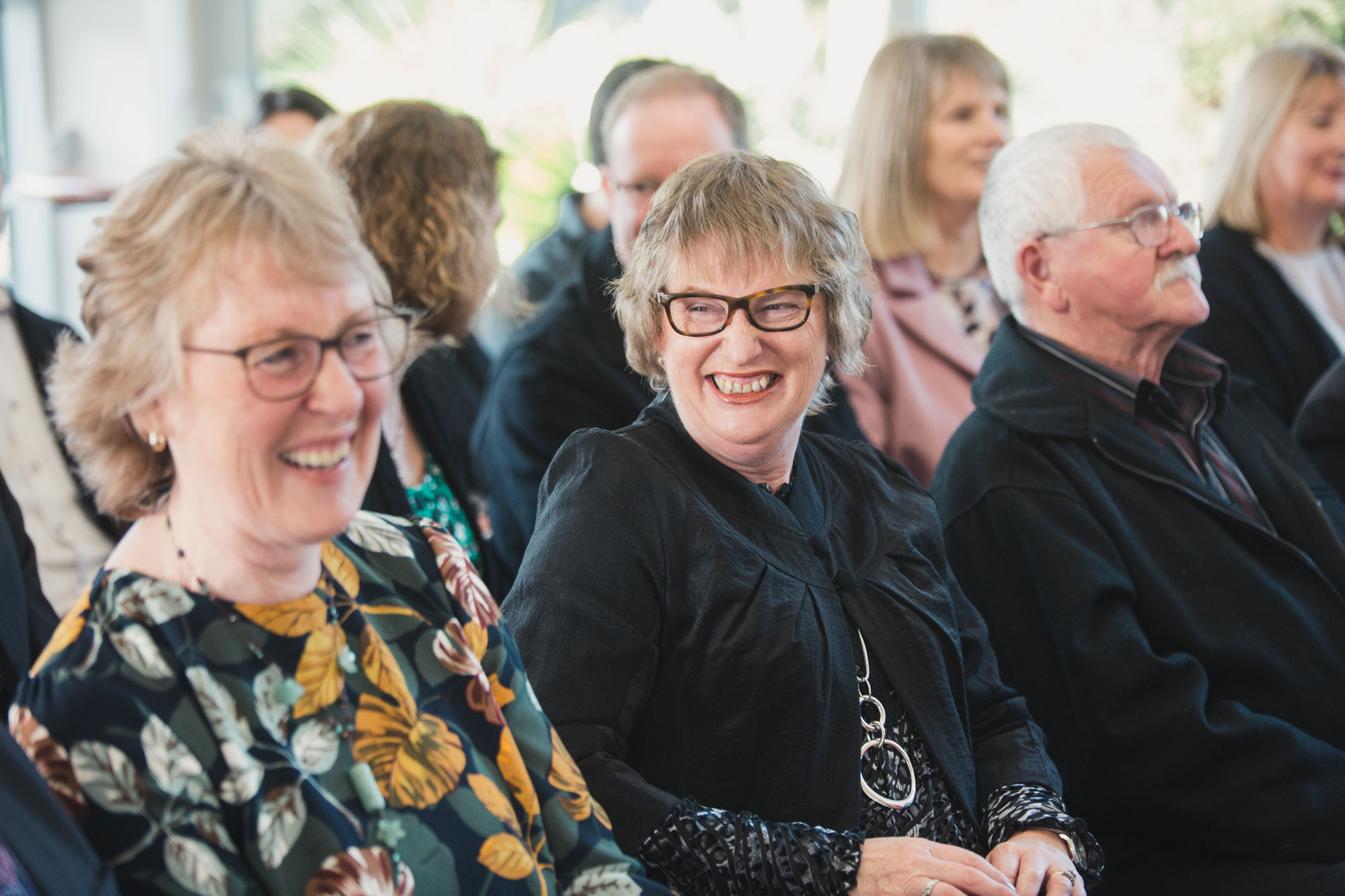 wedding guests smiling