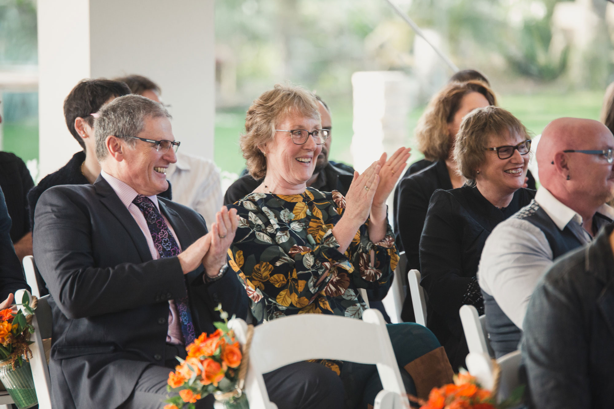 wedding guests clapping