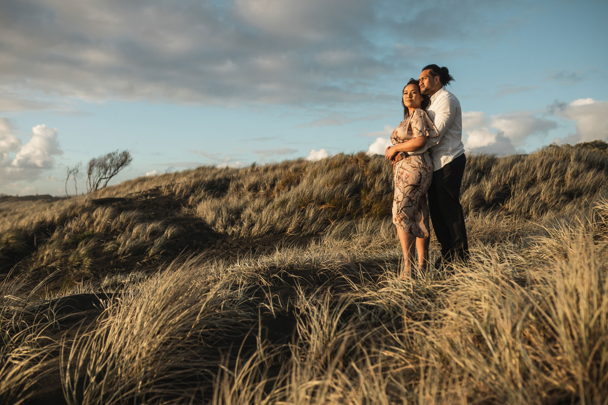 muriwai tree engagement photo