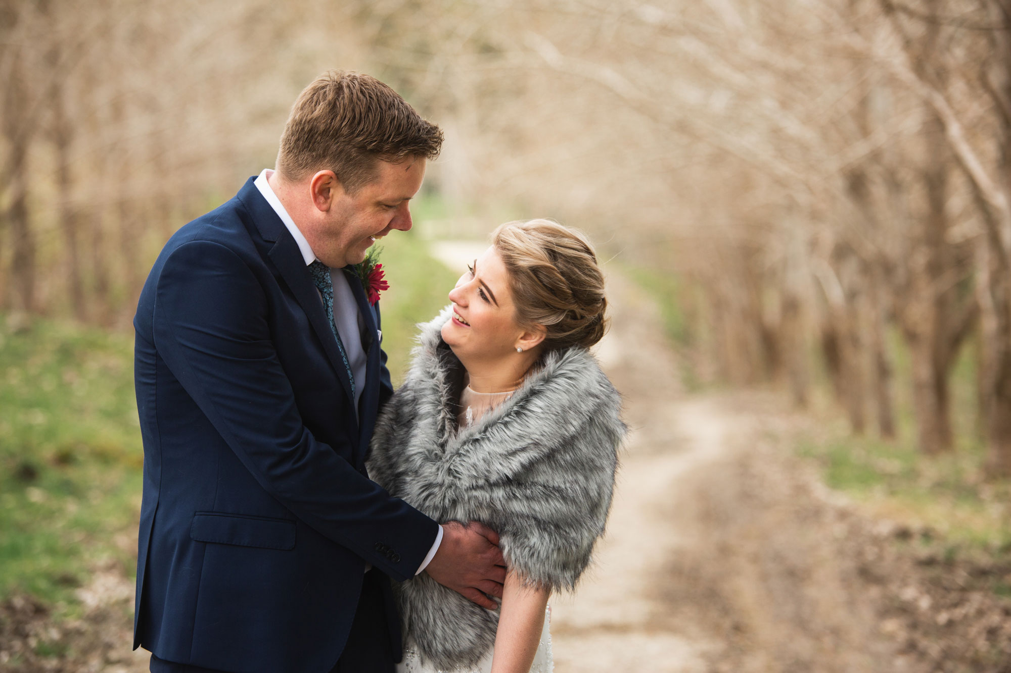 bride and groom laughing