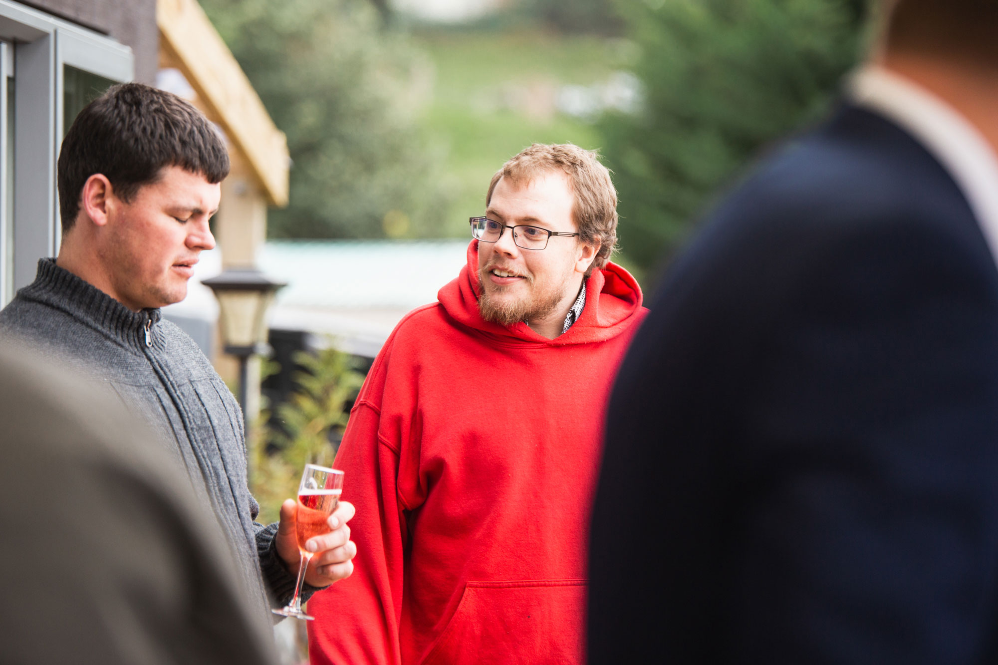 wedding guests talking