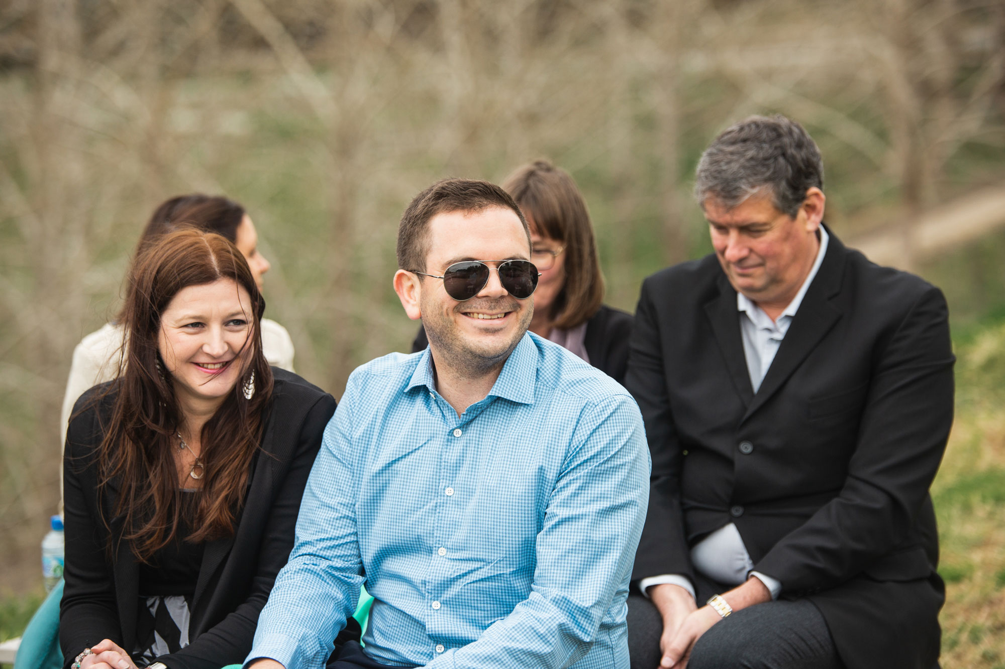 wedding guests laughing