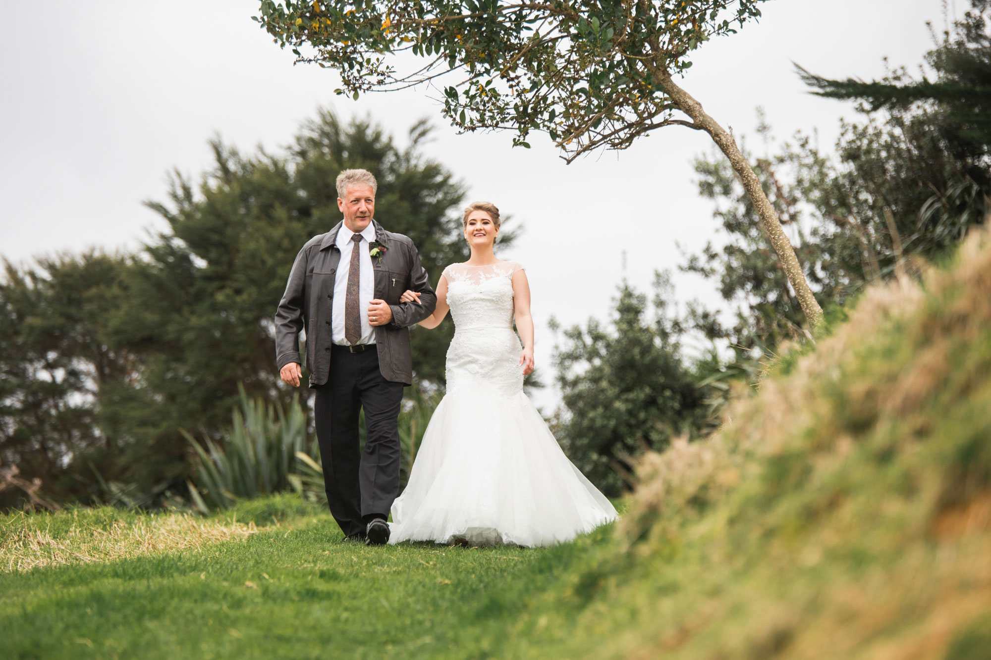 bride and father walking down the aisle