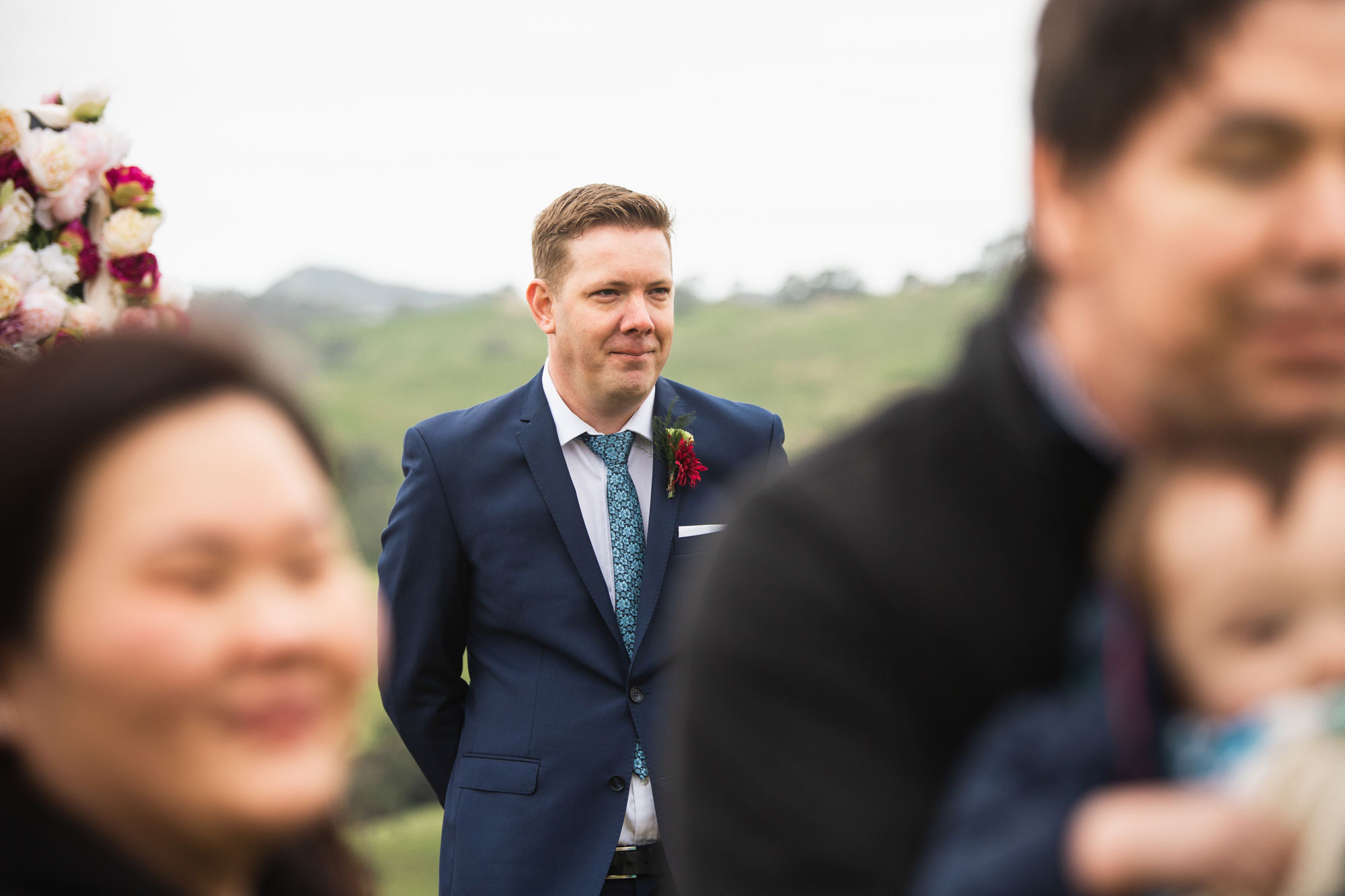 groom looking at bride