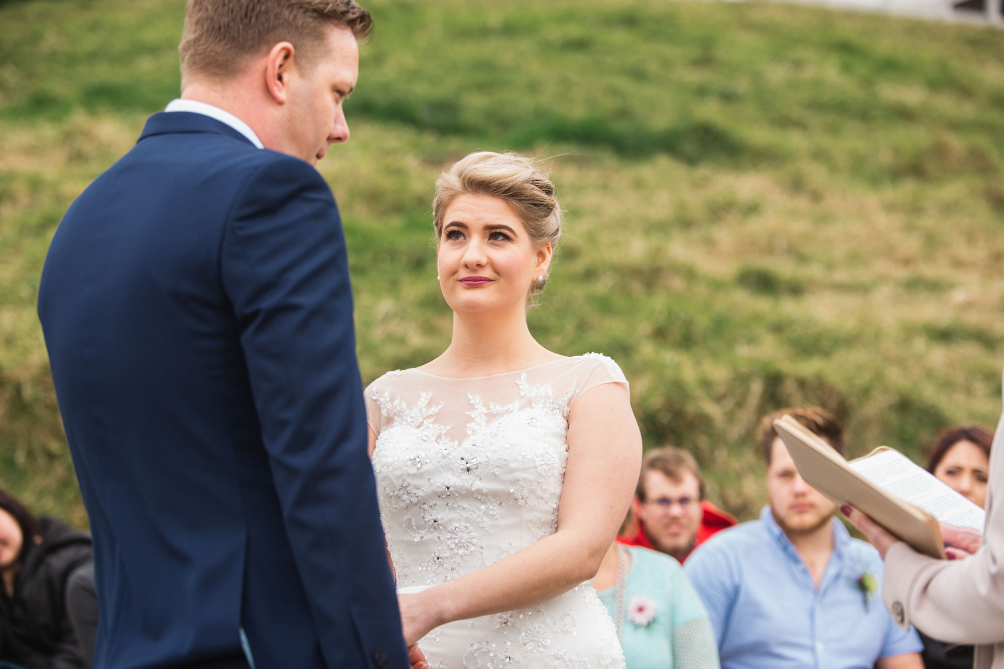 bride looking at the groom