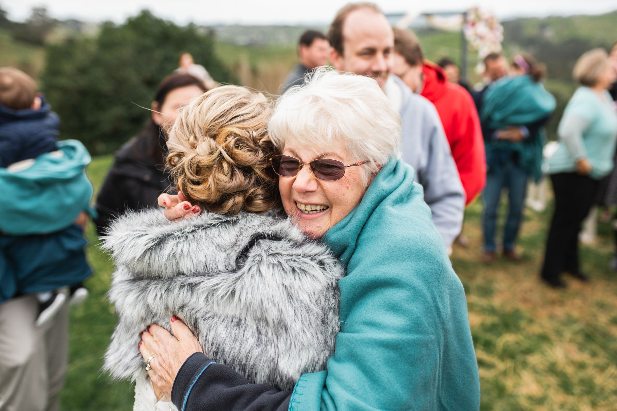 grandma hugging the bride