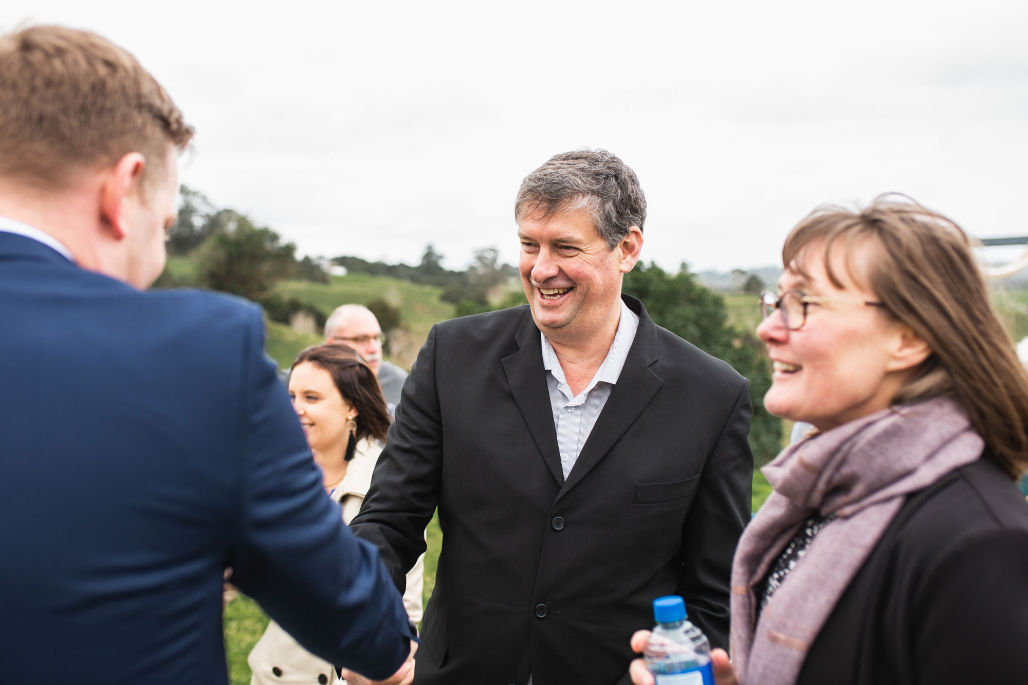 guests smiling at the wedding