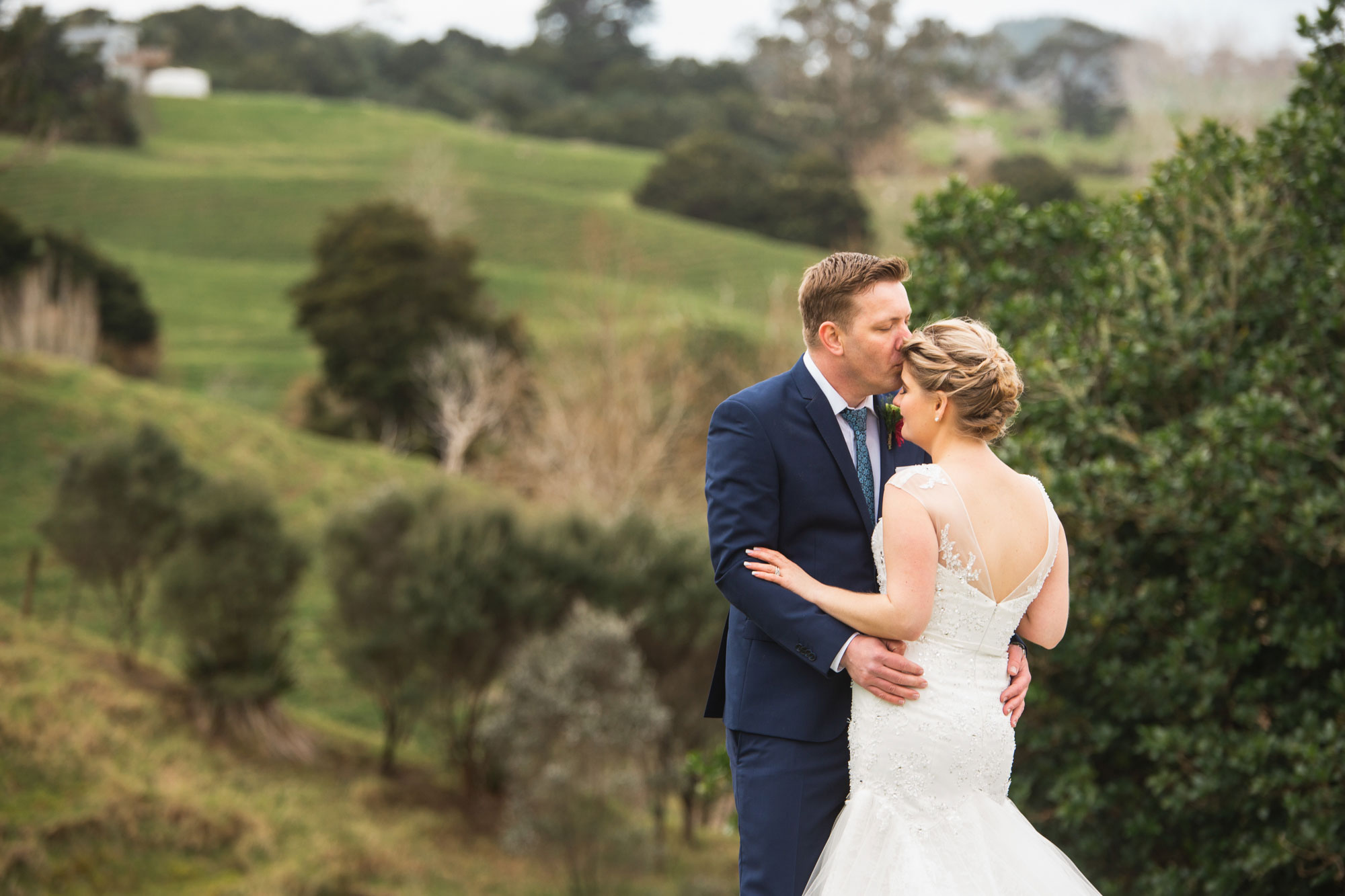 groom kissing the bride