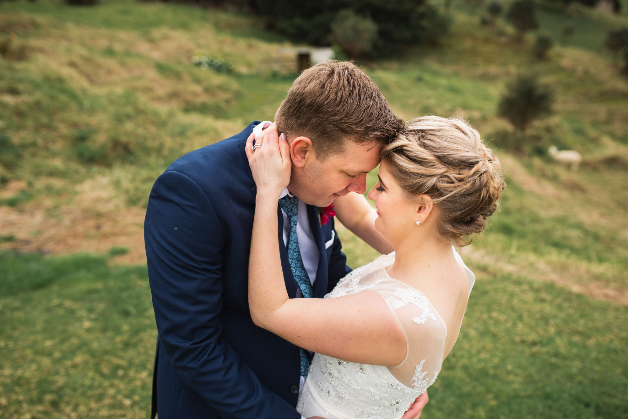 bride and groom embrace