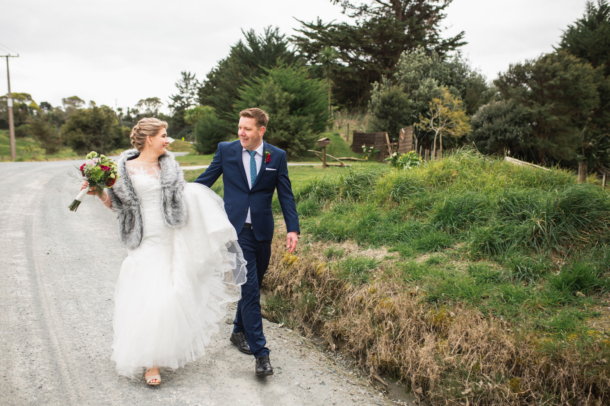 bride and groom having some fun