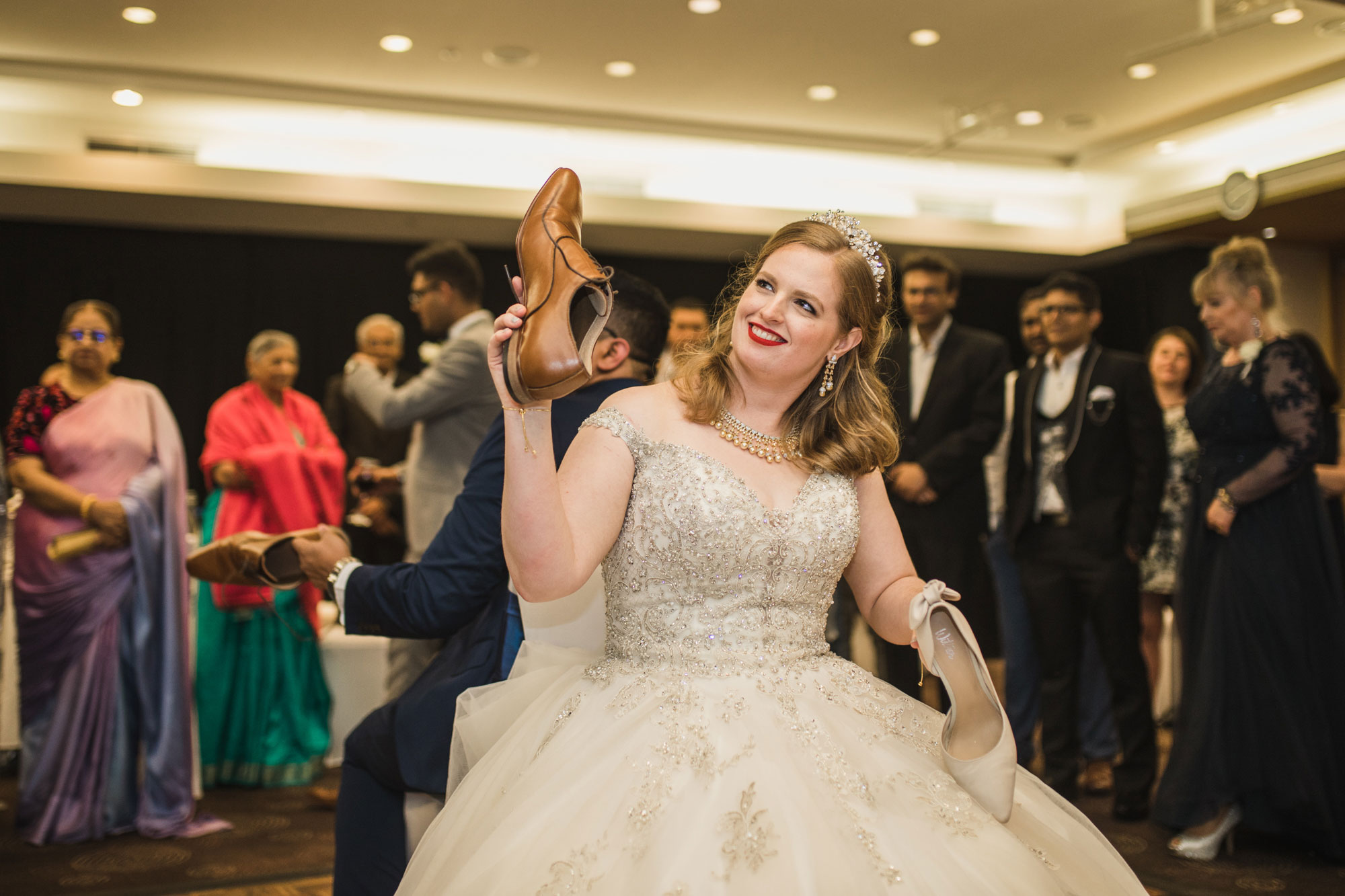 bride playing the shoe game