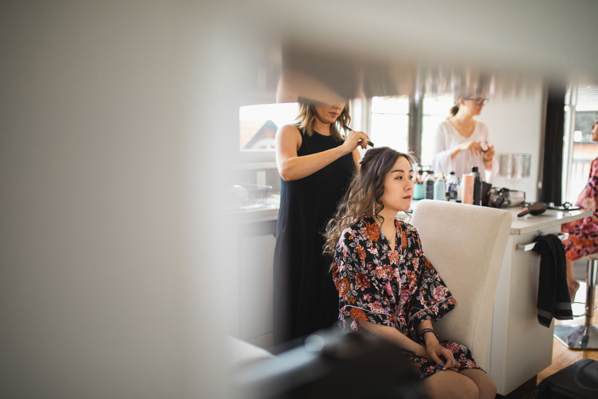 bridesmaid getting make up done