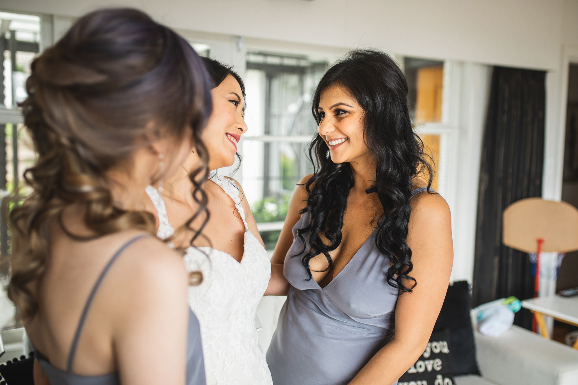 bride and the girls smiling