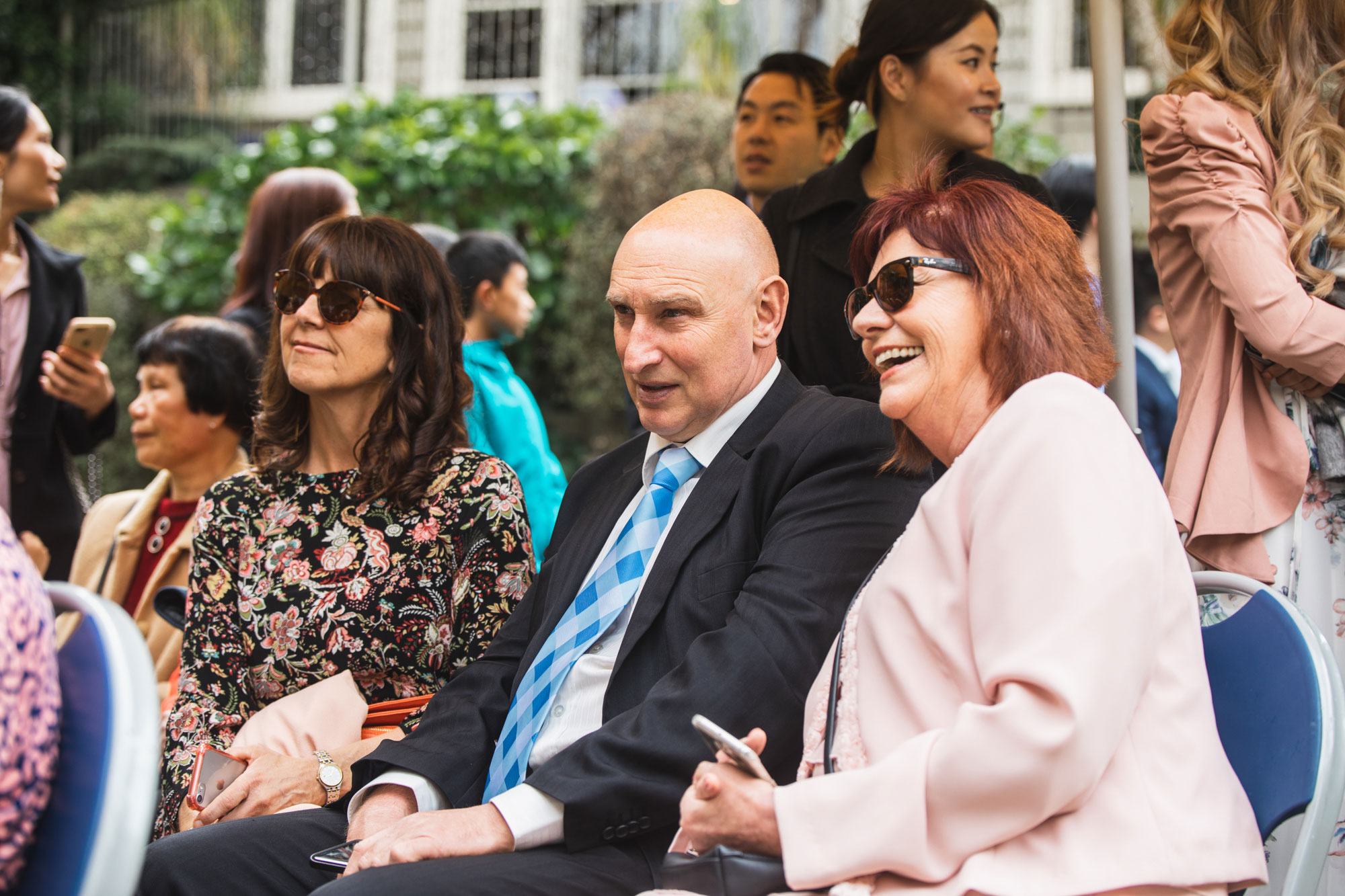 wedding guests smiling