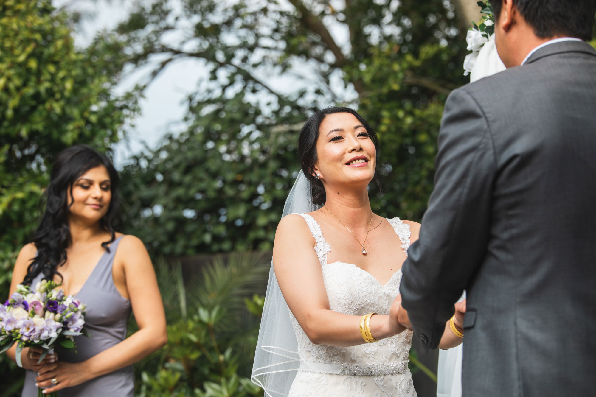 bride smiling at the ceremony