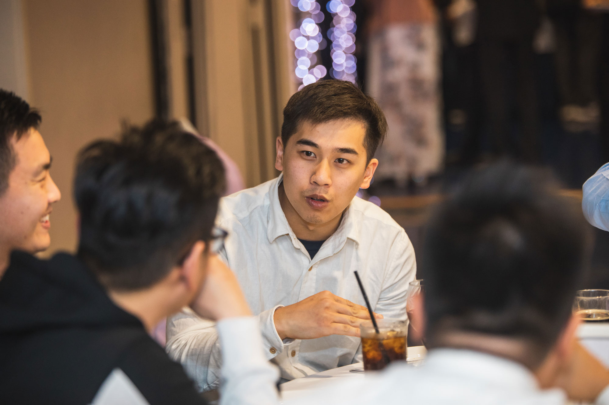 wedding guest talking during reception