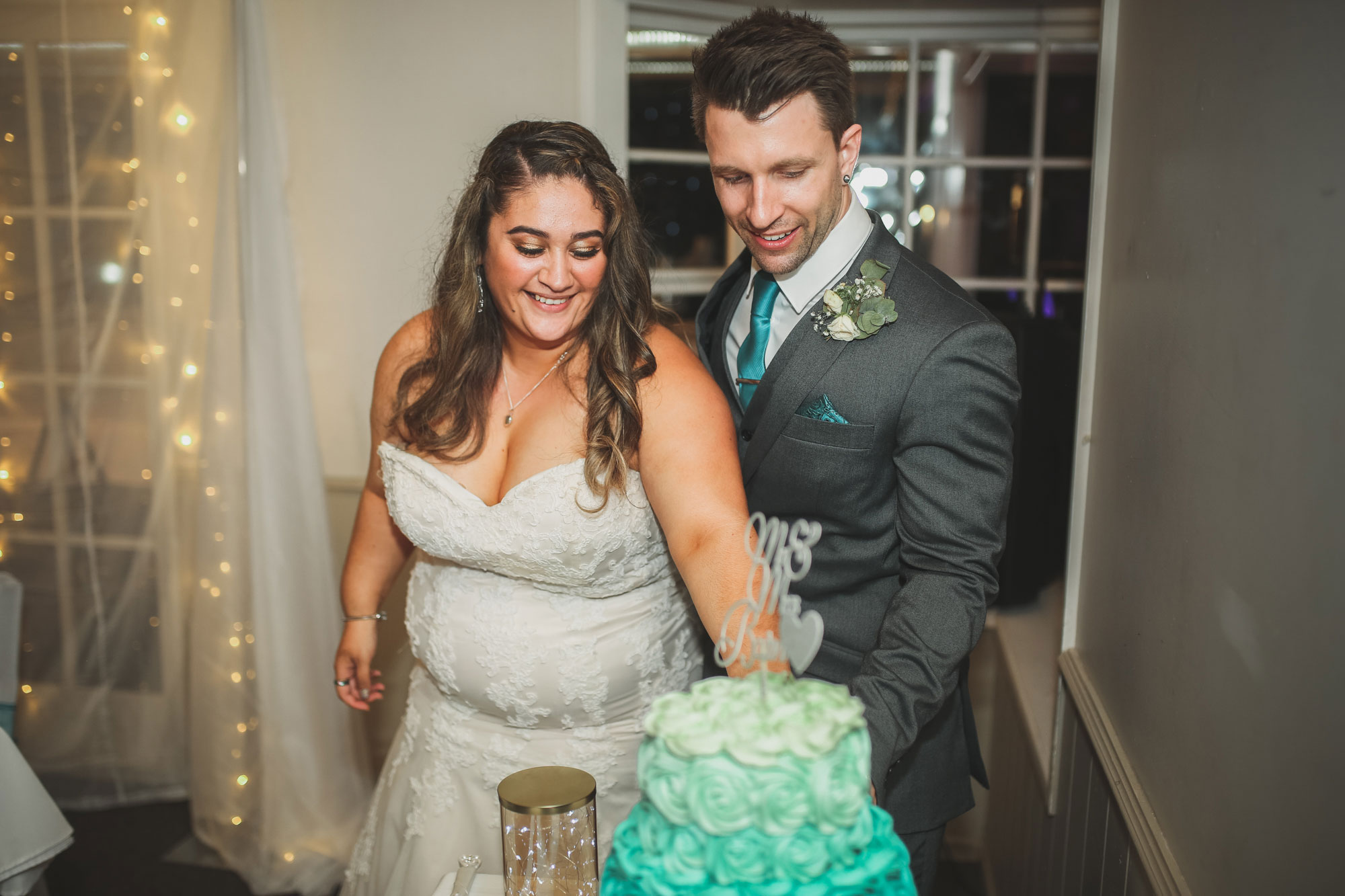 the brigham wedding cake cutting
