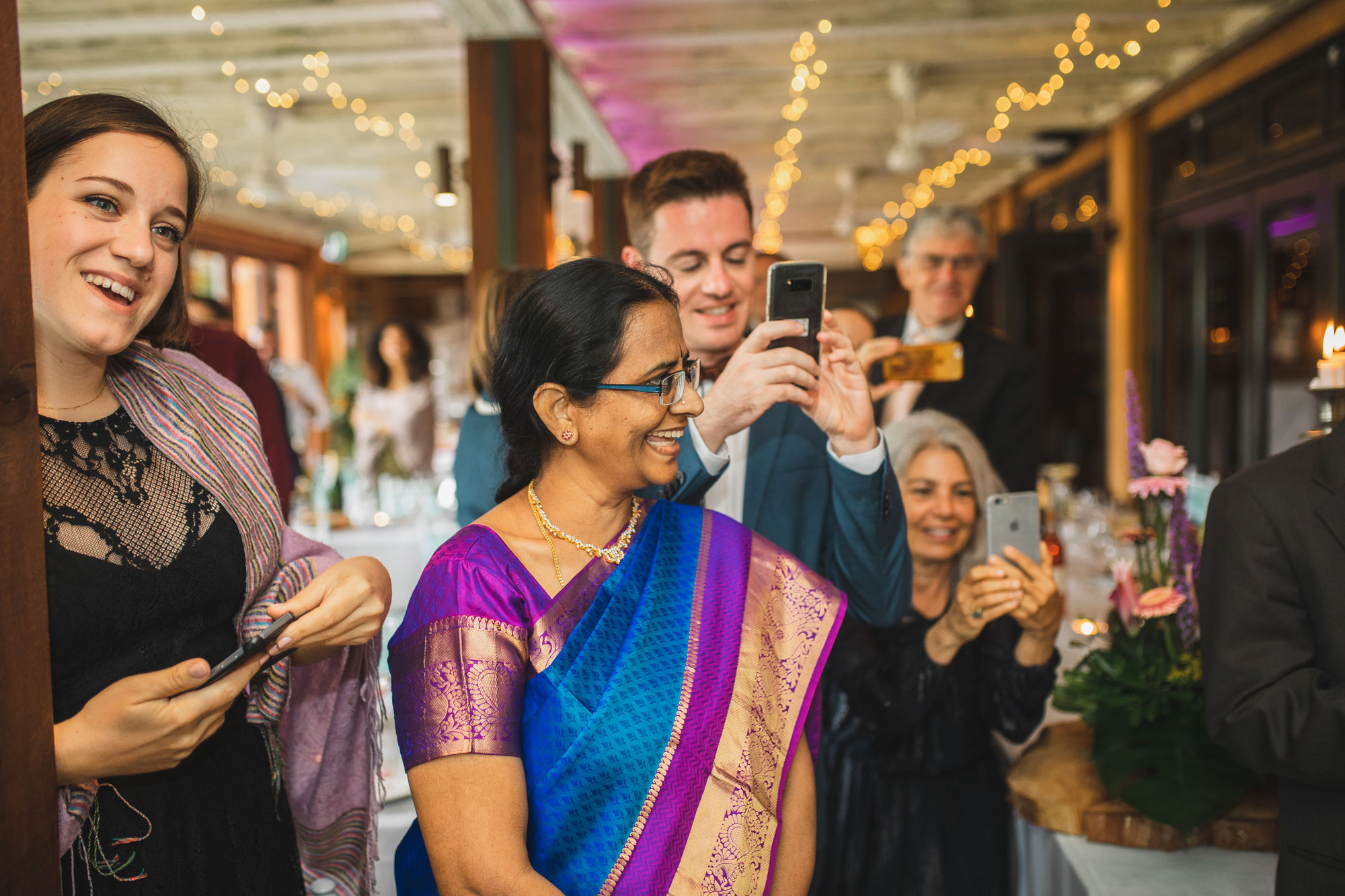 auckland wedding guests laughing