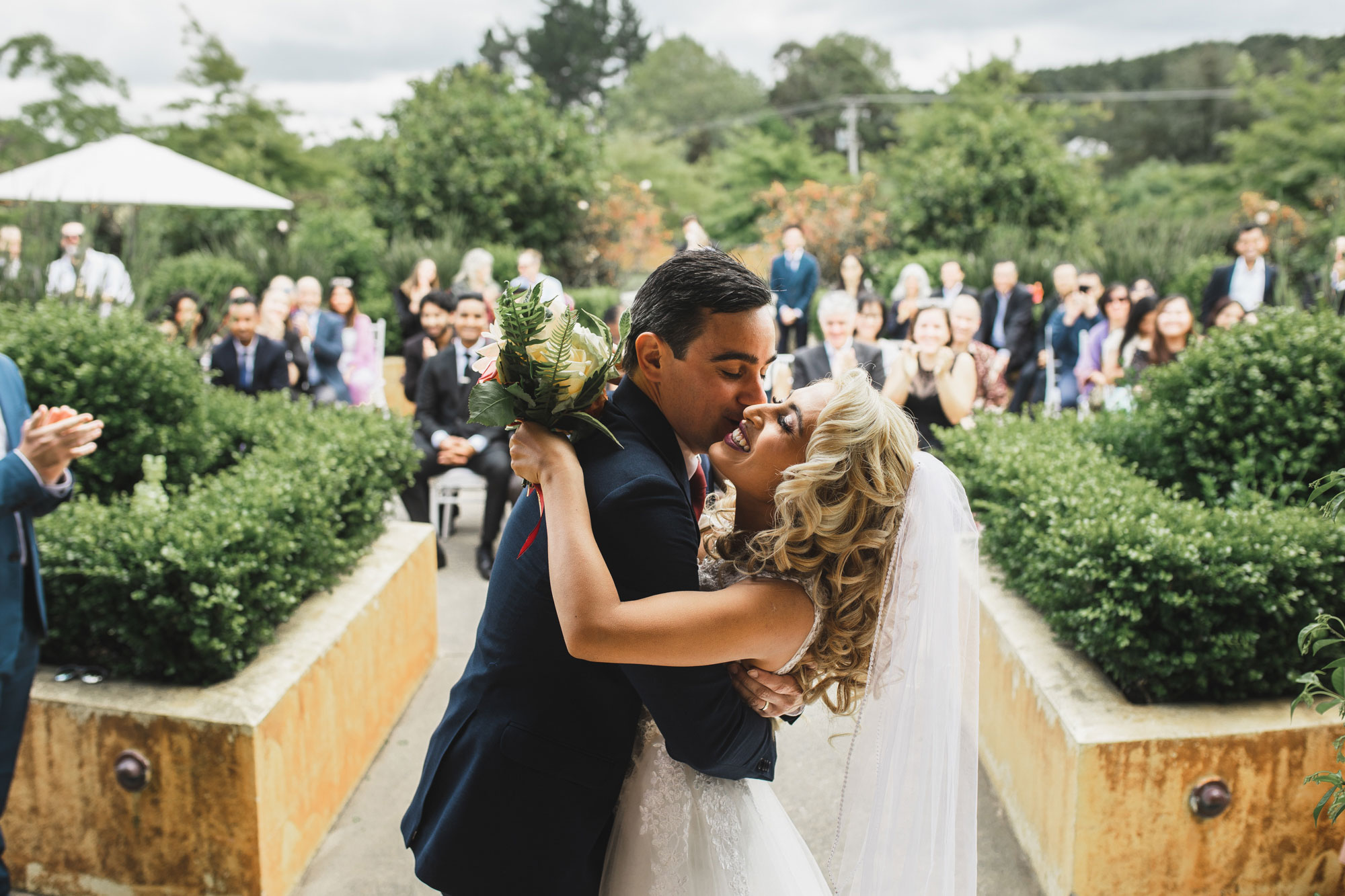 ascension wine estate wedding kiss