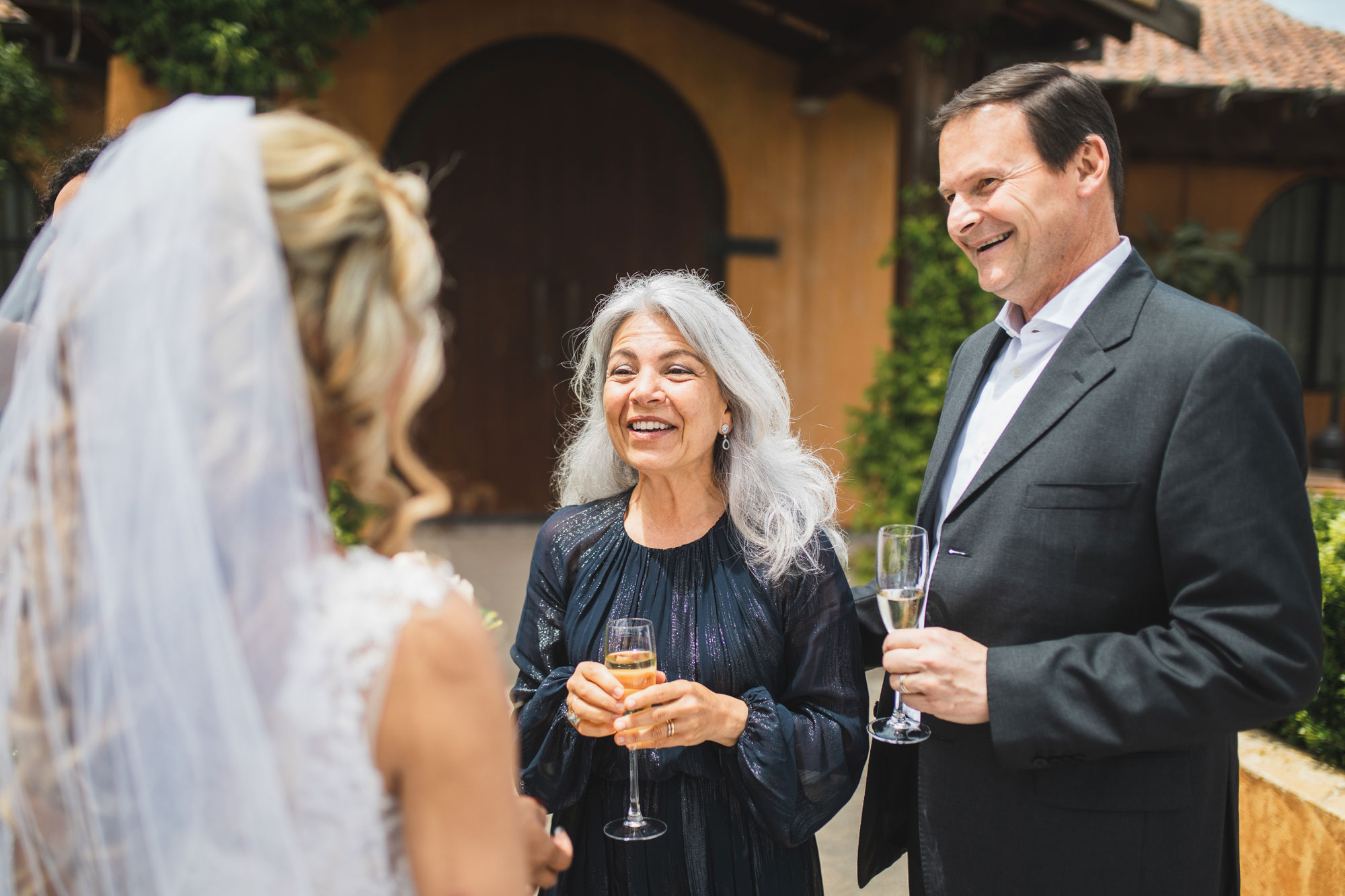 auckland wedding bride chatting with guests