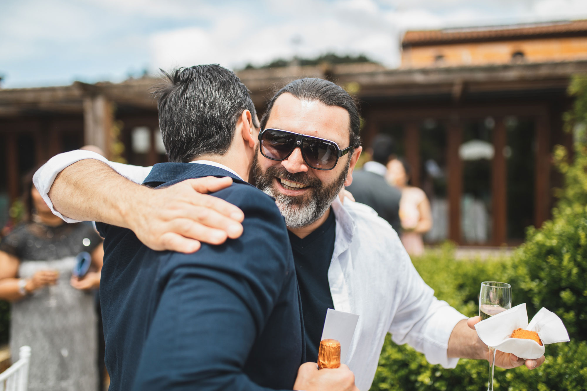 ascension wedding guest hugging