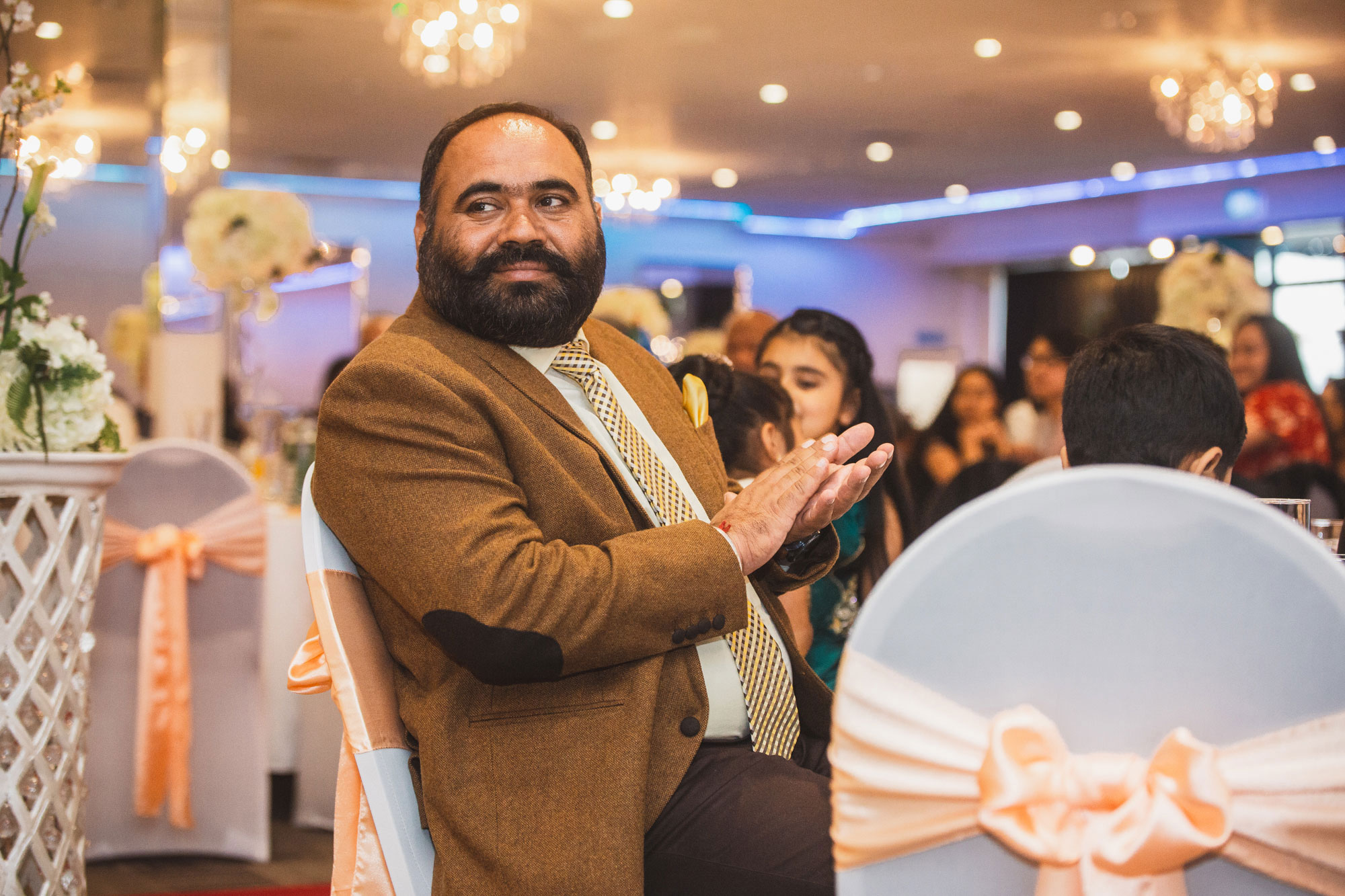 wedding guest clapping