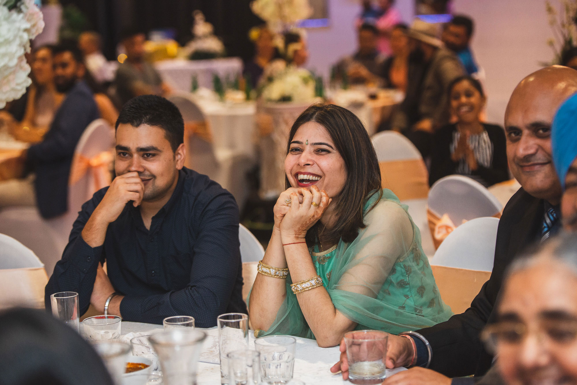 wedding guest smiling