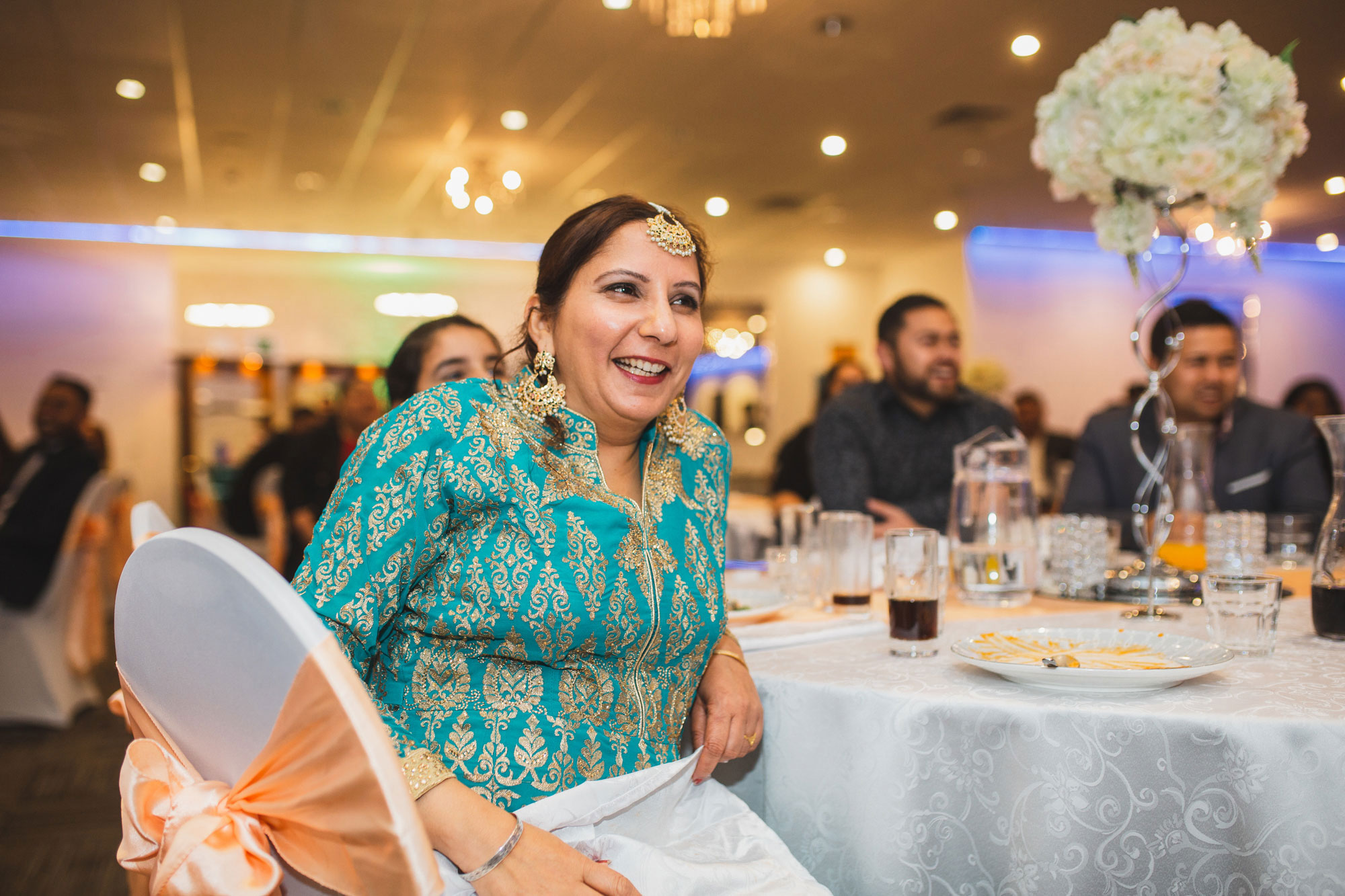 wedding guest enjoying performance