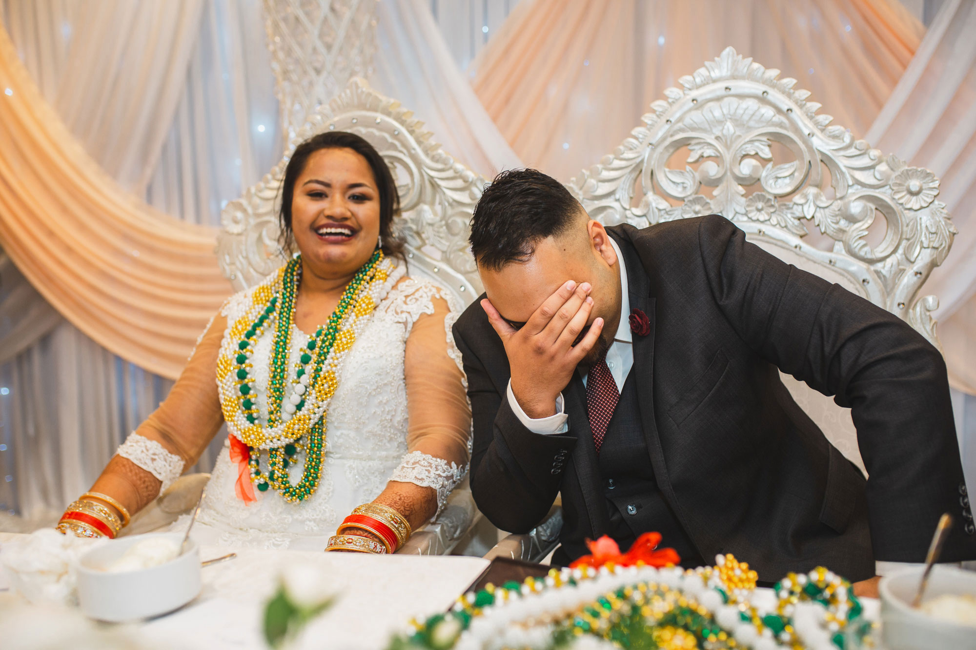 groom laughing at speech