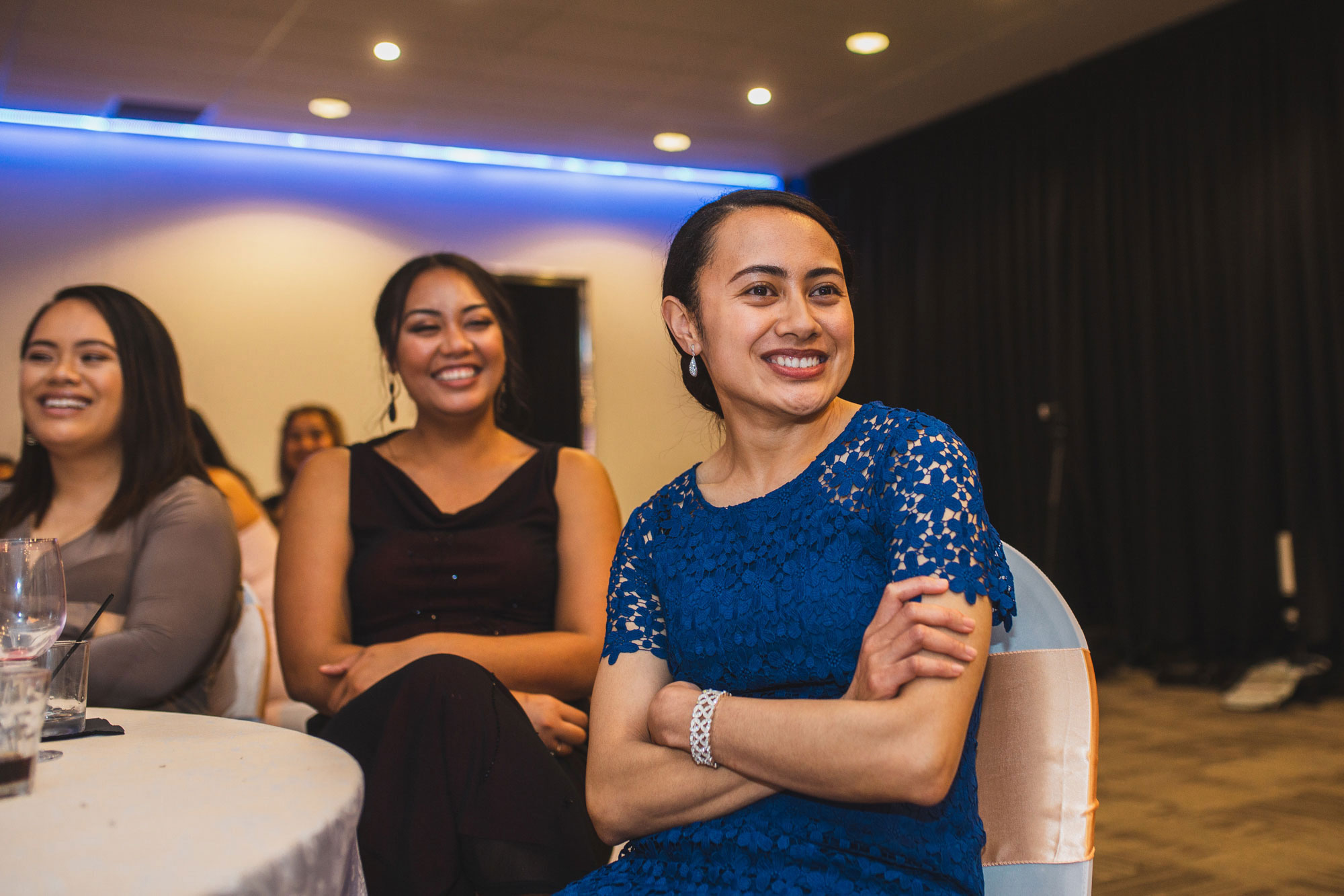 wedding guests listening to speech