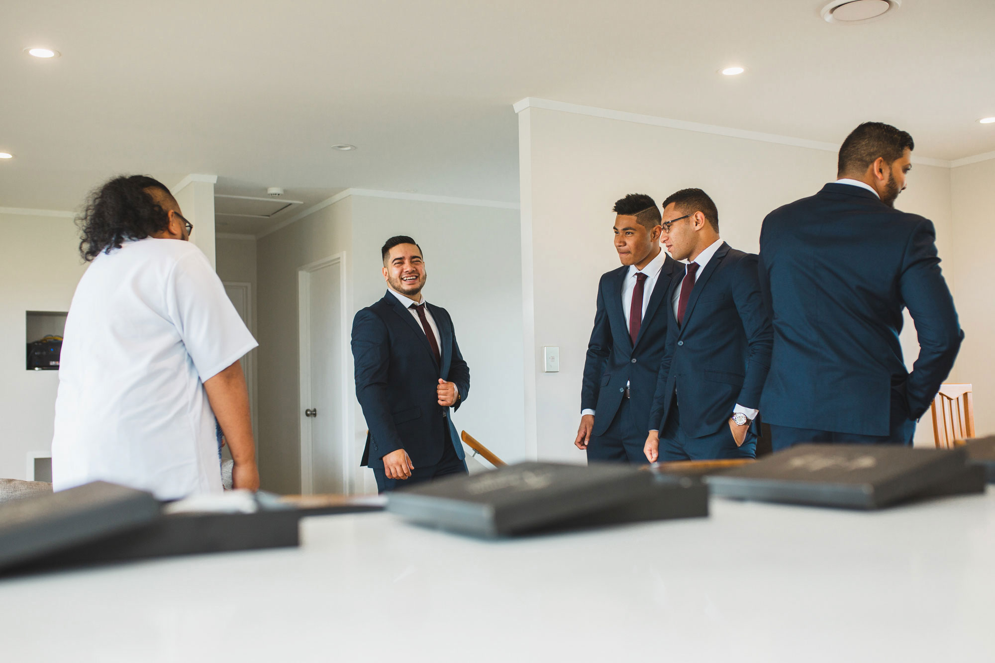 groomsmen laughing