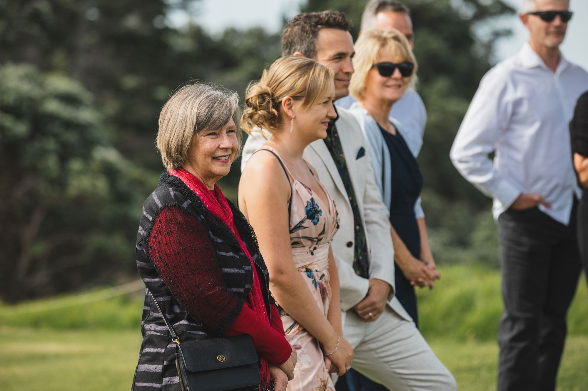 auckland wedding guest smiling