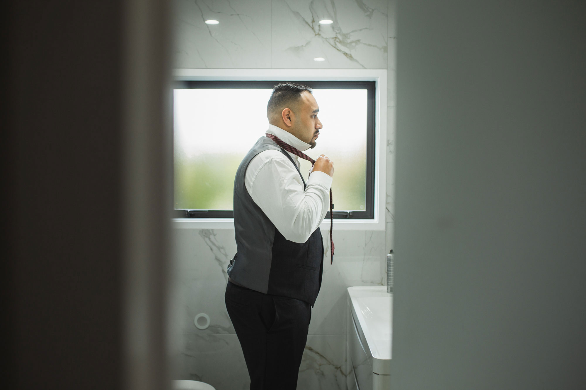 groom getting ready for wedding