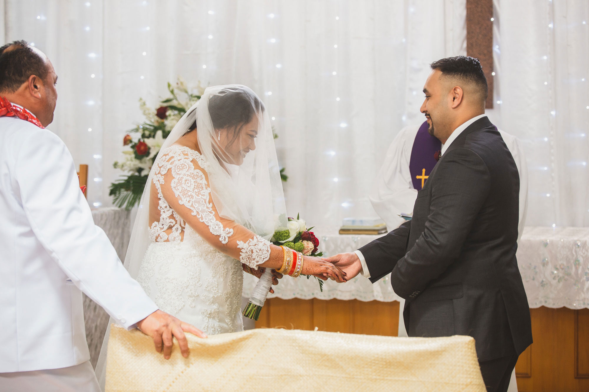 bride smiling at groom