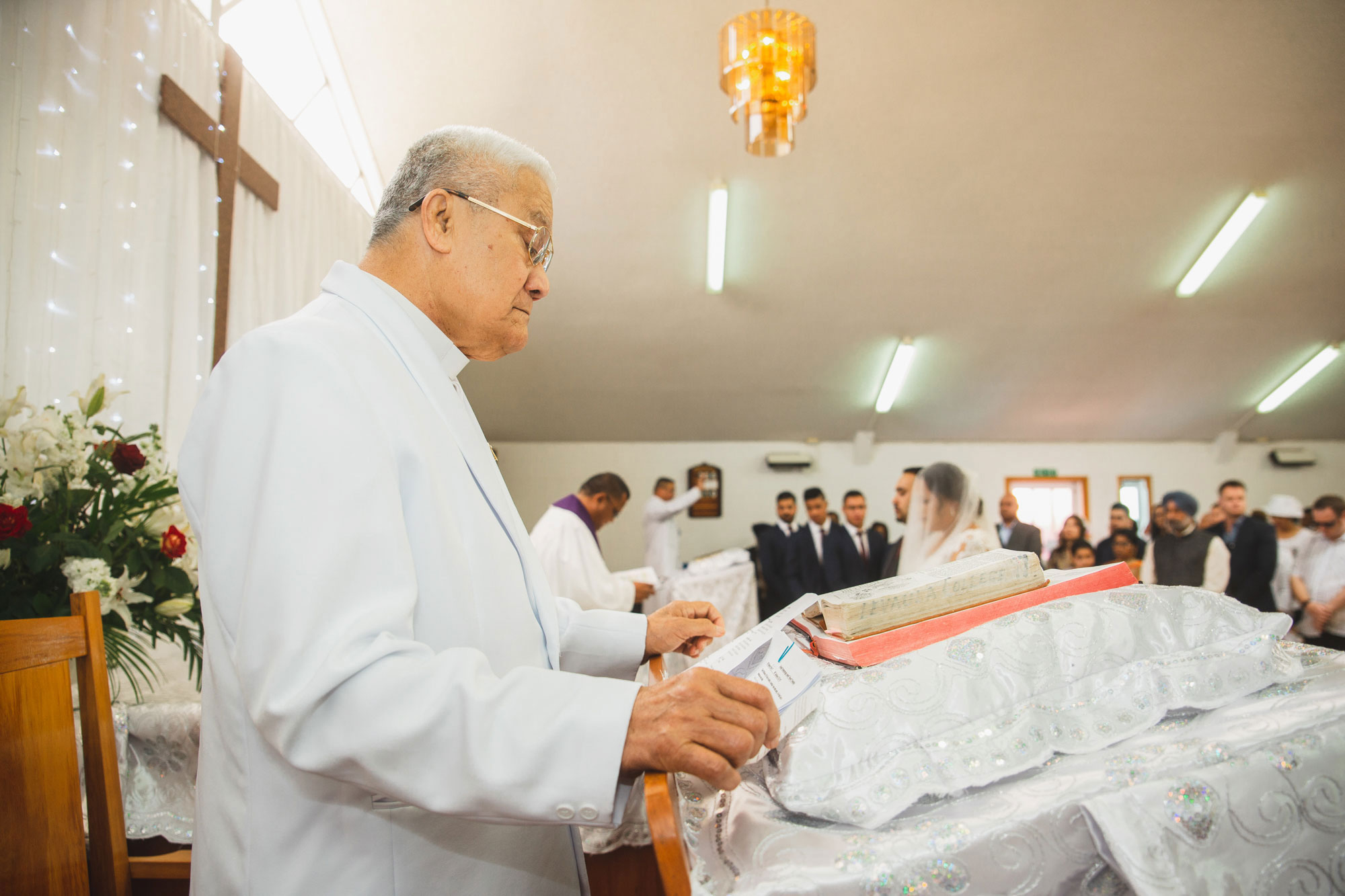 pastor reading at the wedding