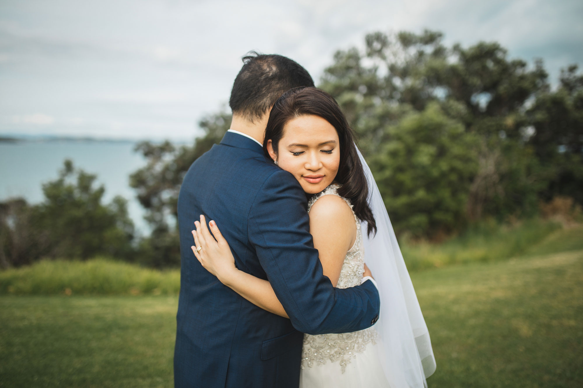 auckland wedding couple embrace