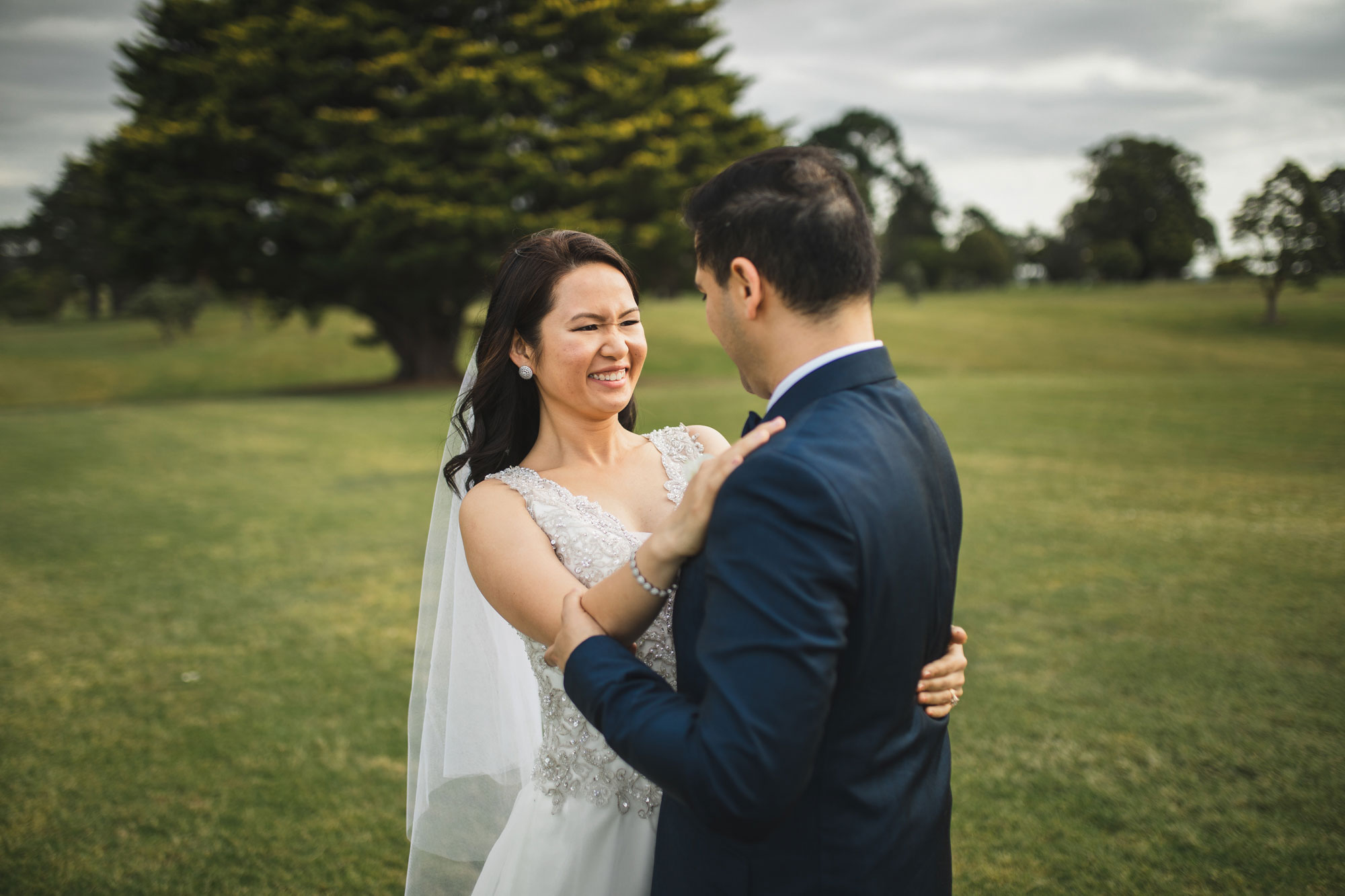 auckland wedding bride smiling at groom