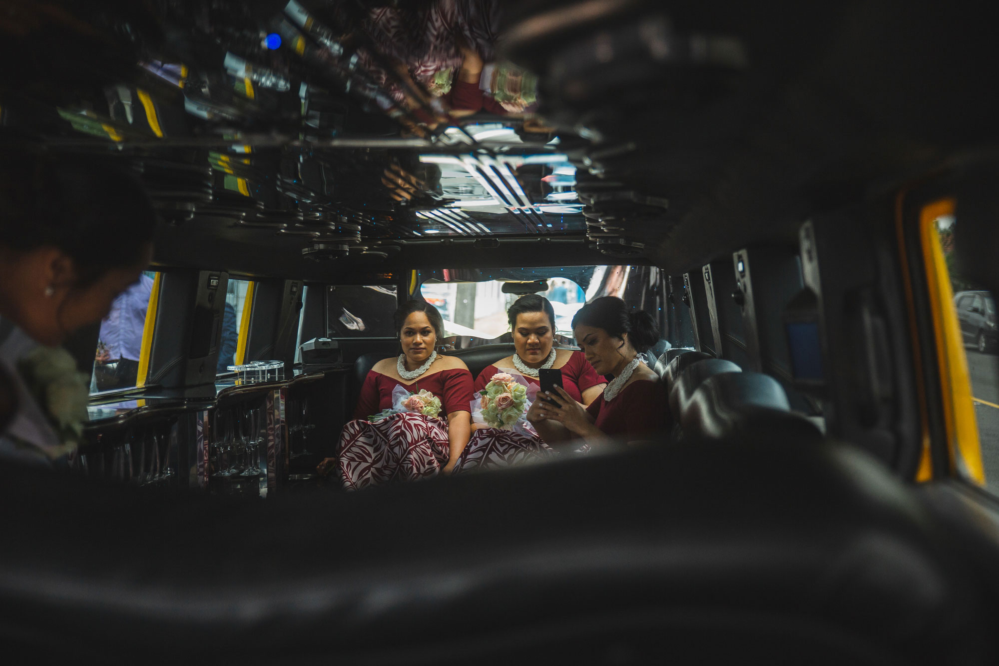 bridal party in wedding car