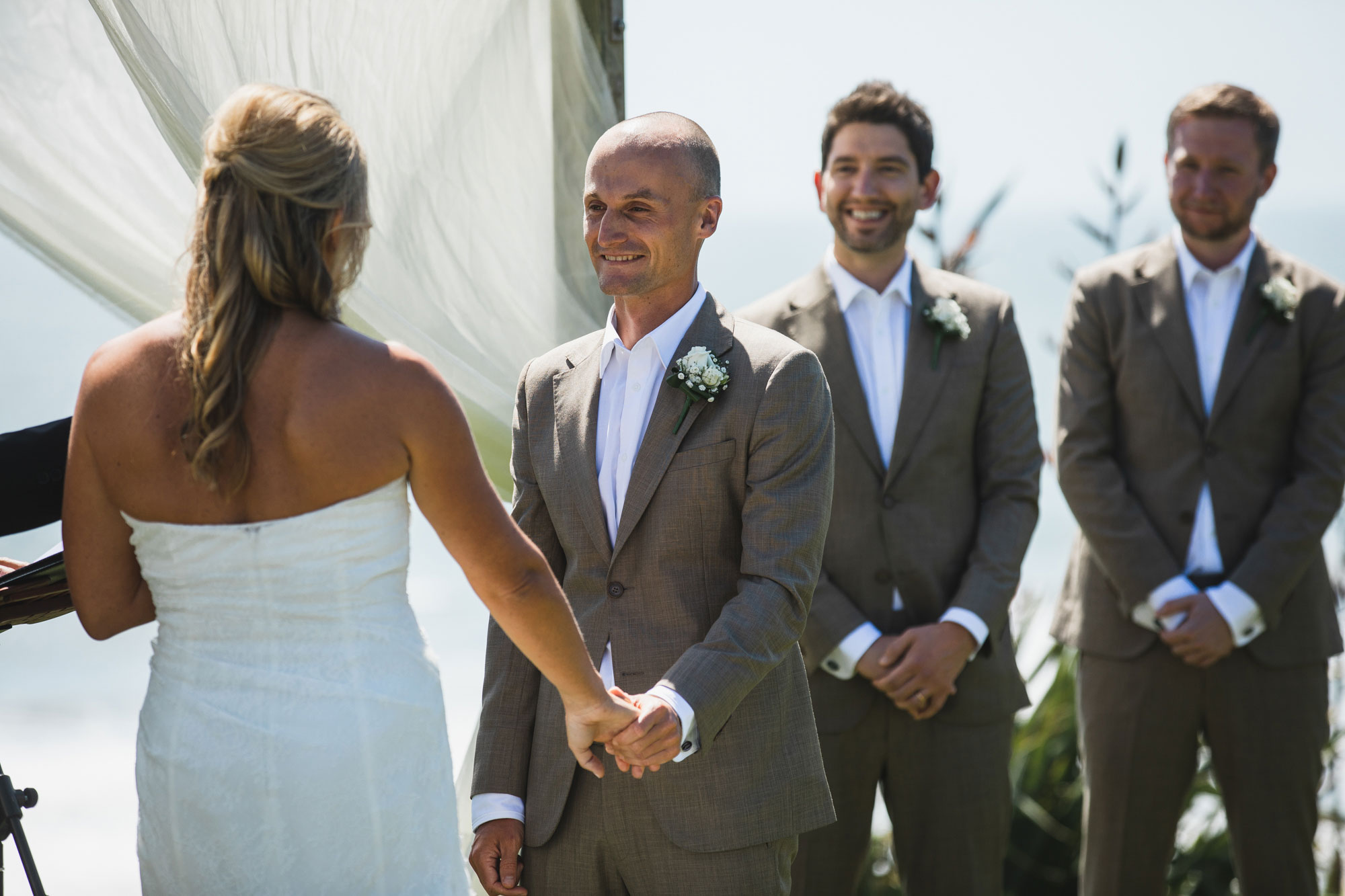 castaways wedding groom smiling