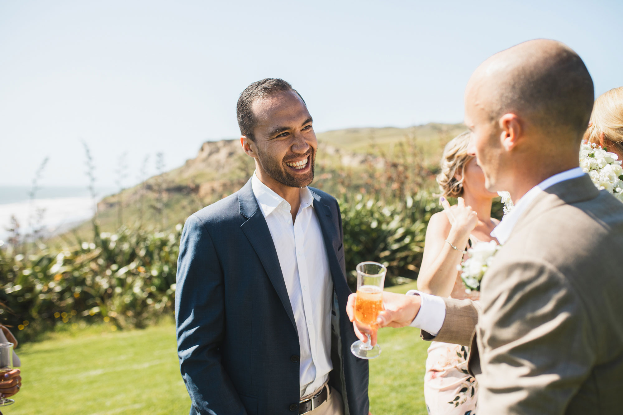 wedding guest laughing